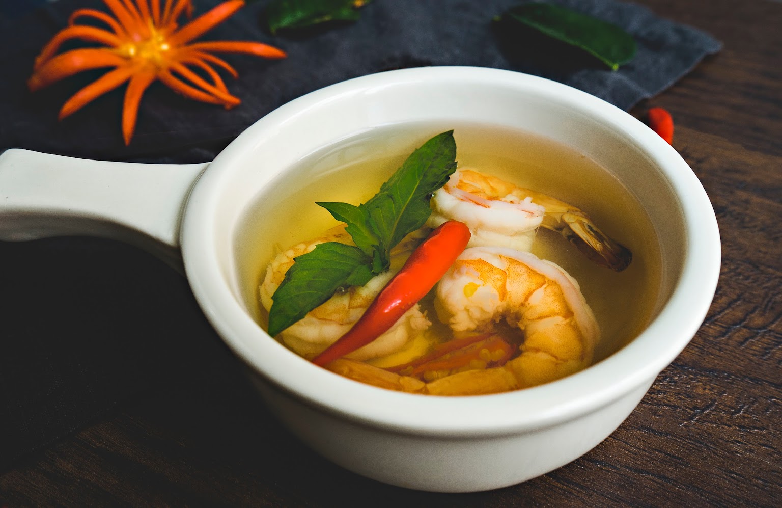 Lemongrass Soup served with the aroma of basil leaves and mixed herbs