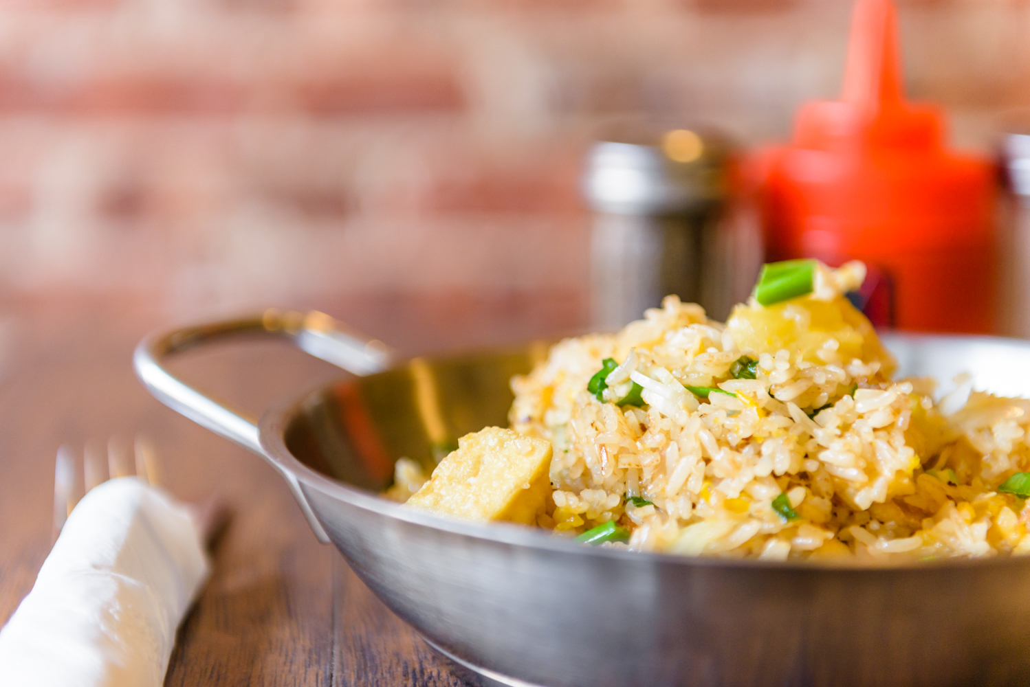 Classic Fried Rice served with jasmine rice, egg, scallion, and onion