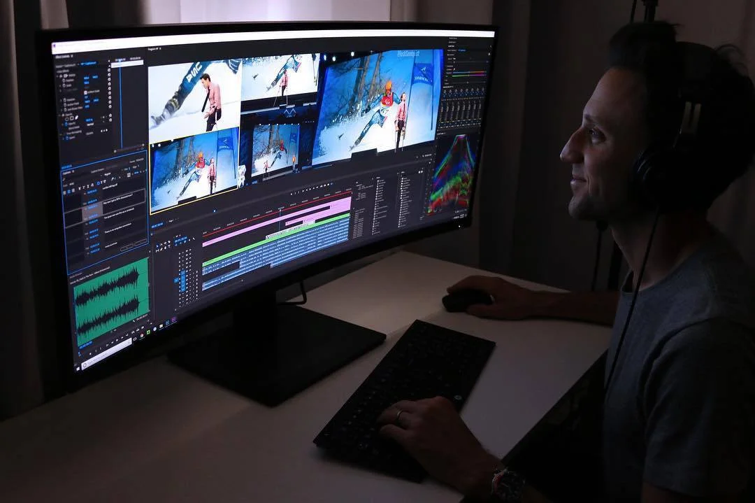 Josh edits video of one of his motivational keynote speeches for a technology company