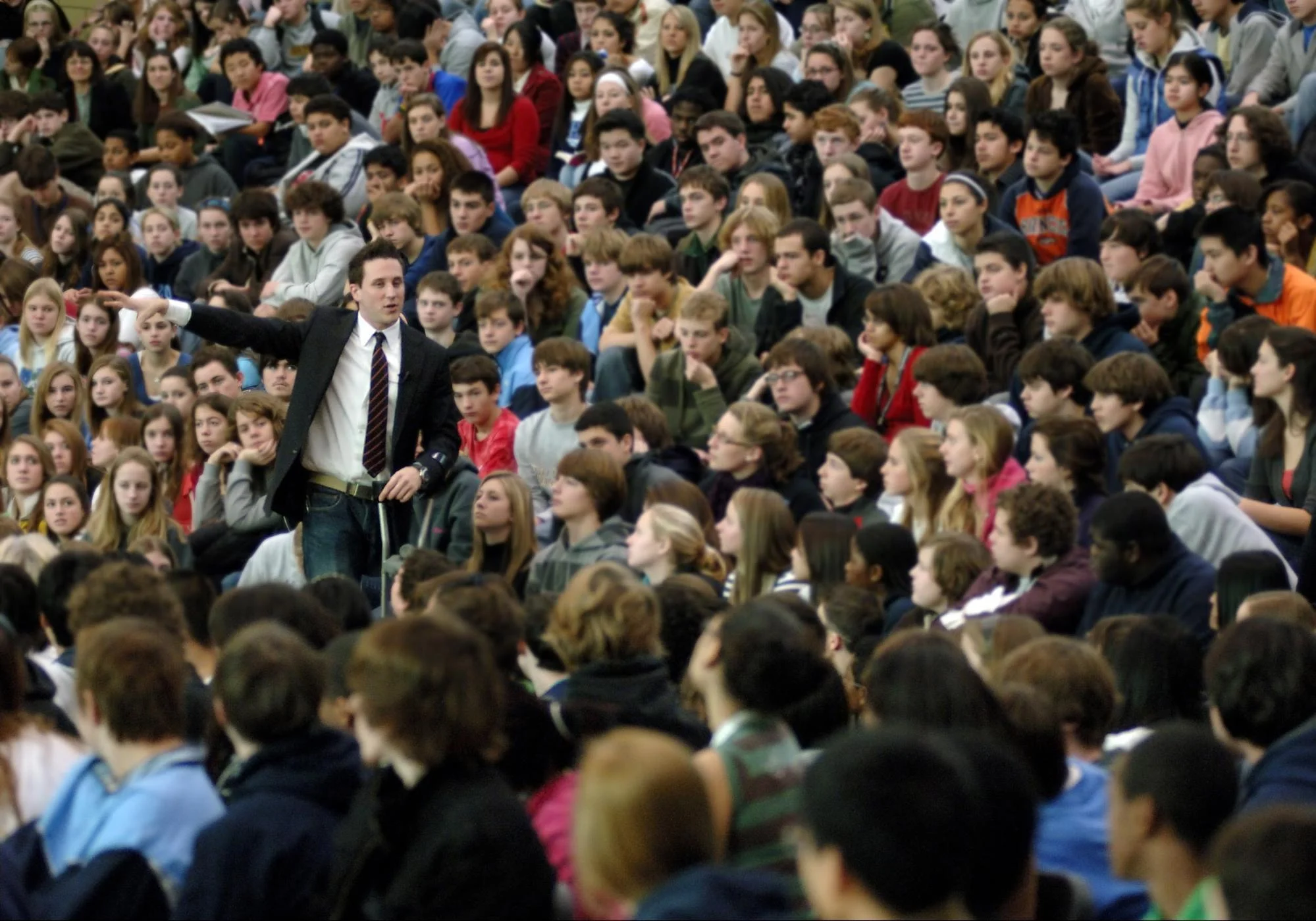 Top youth speaker Josh Sundquist gives a speech to teens at a high school
