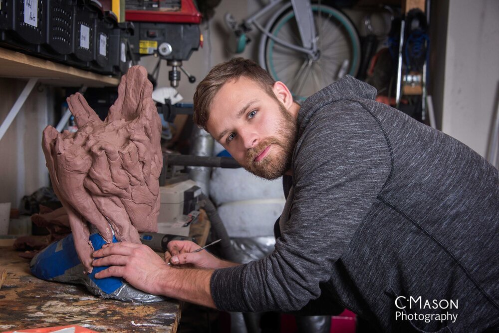 Here's the cosplay master himself Calen Hoffman sculpting a bust of Groot in his workshop.