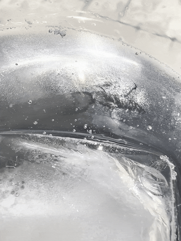 ClearLiquidPourBubblesIce-optimize.gif