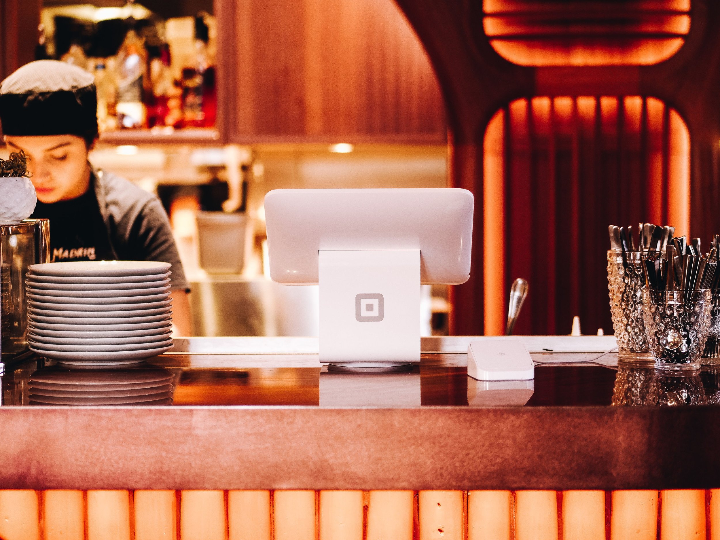  A pay station in a cafe with the modern pad used to make payments in a business  