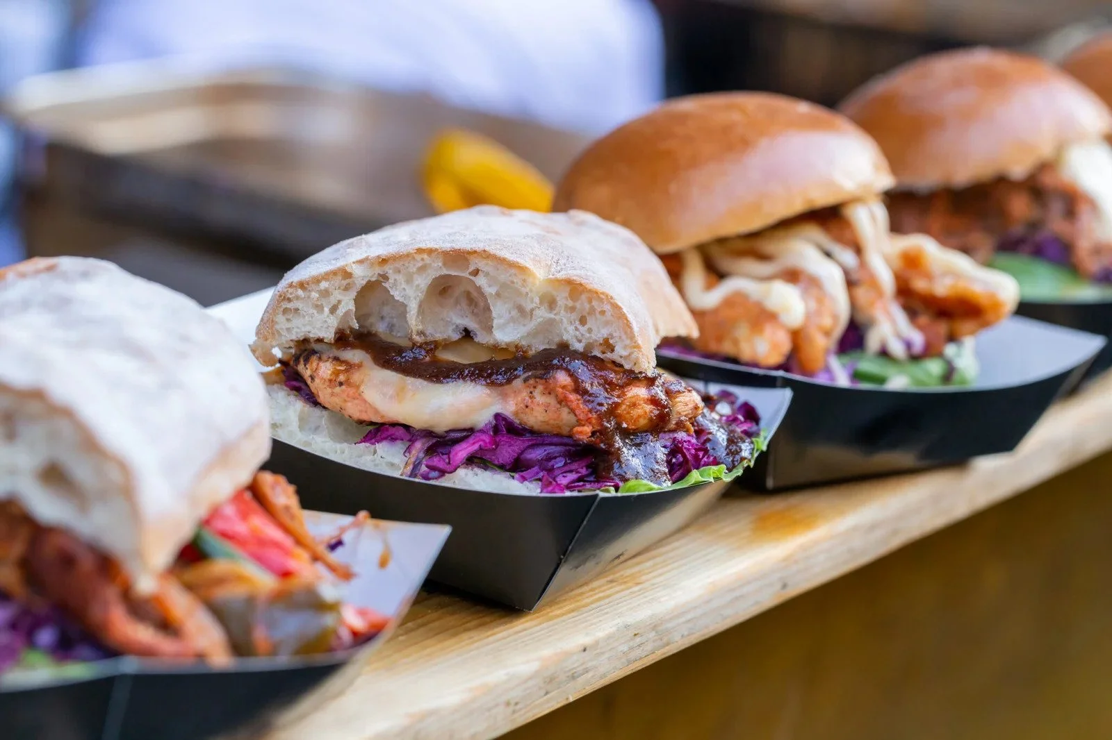 chicken-burgers-displayed-on-a-market-stall-2026-01-05-05-39-10-utc-2048x1365.jpg