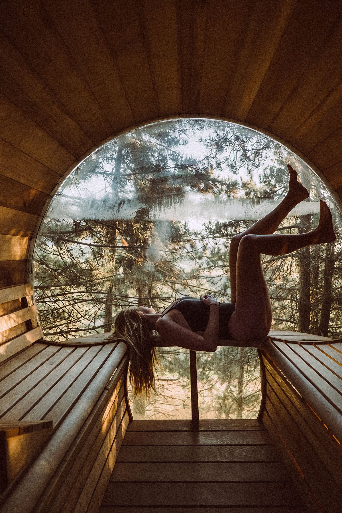 nest-woman-lying-in-cedar-sauna.jpg