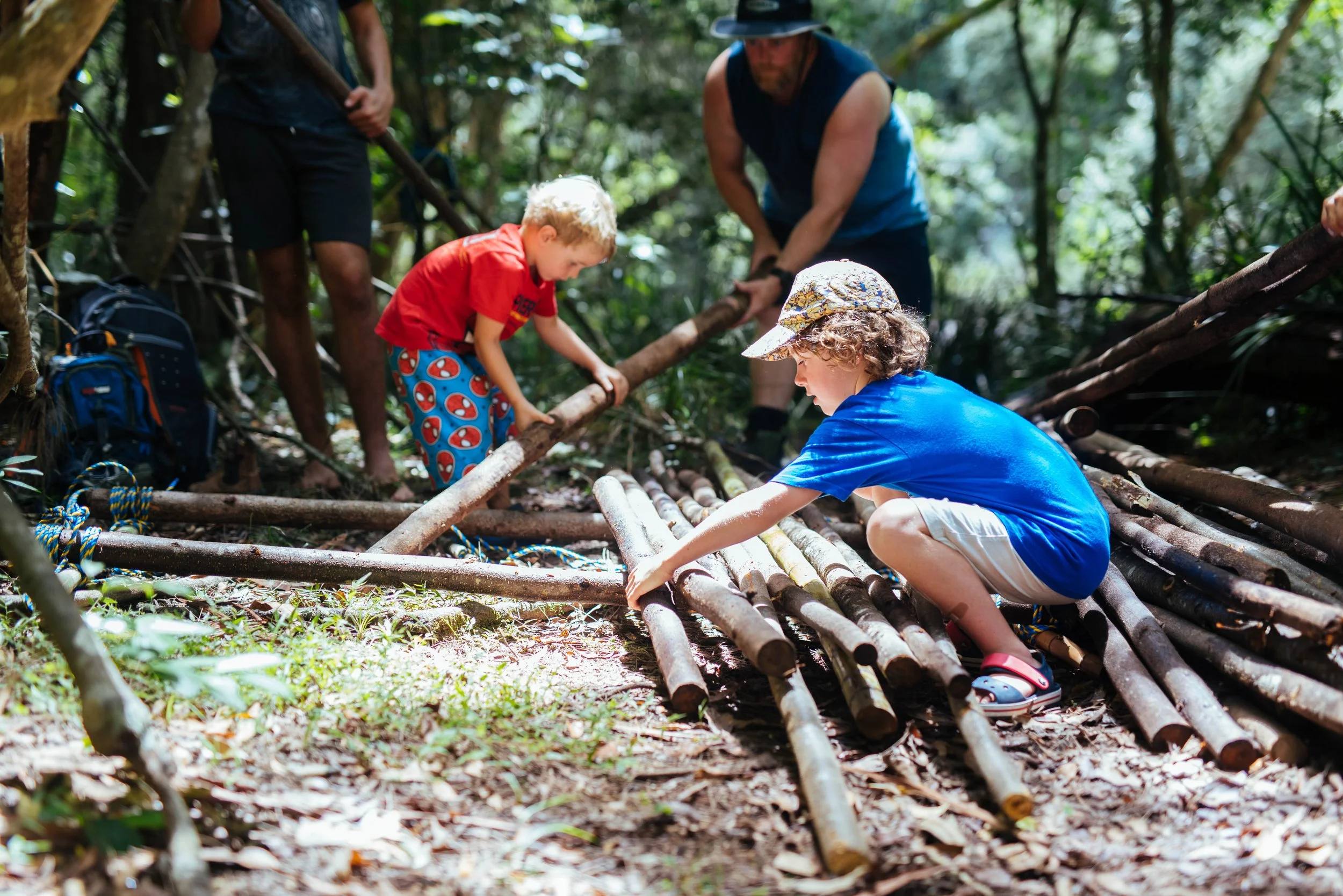 Kids doing bush craft, building raft