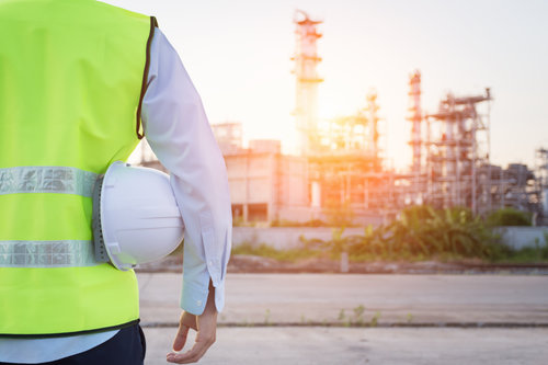 Man in high vis - oil plant .jpeg