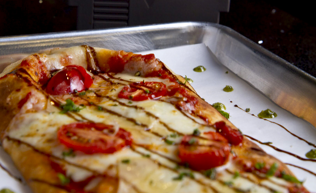 Fresh pizza made in-house! (Pictured: "The Plumber")