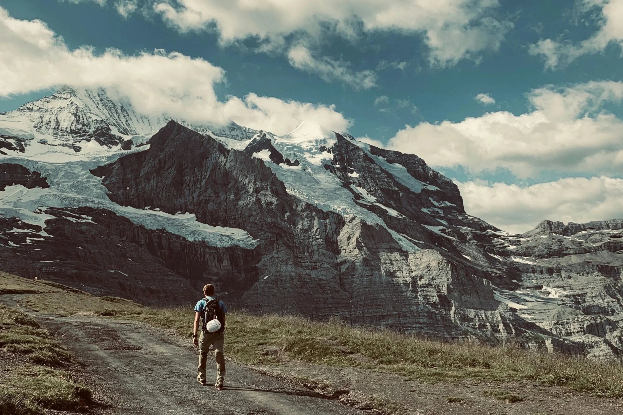 Person walking through a mountain range