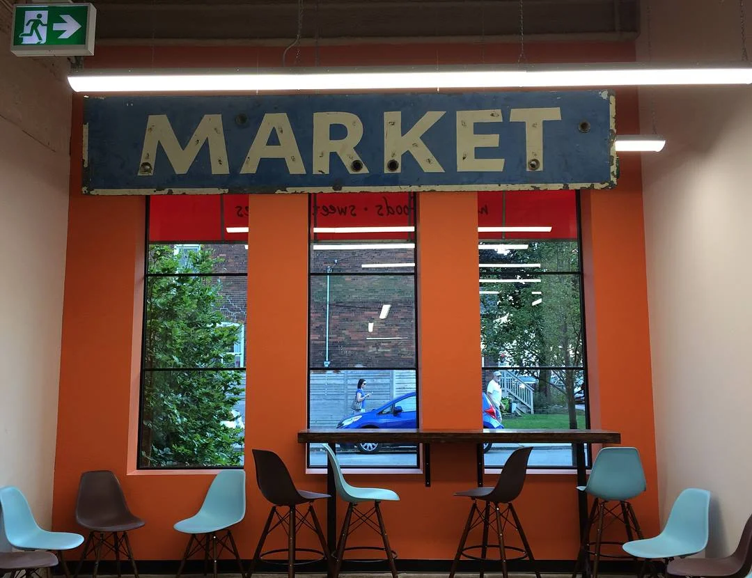 Seating area with re-used local signage