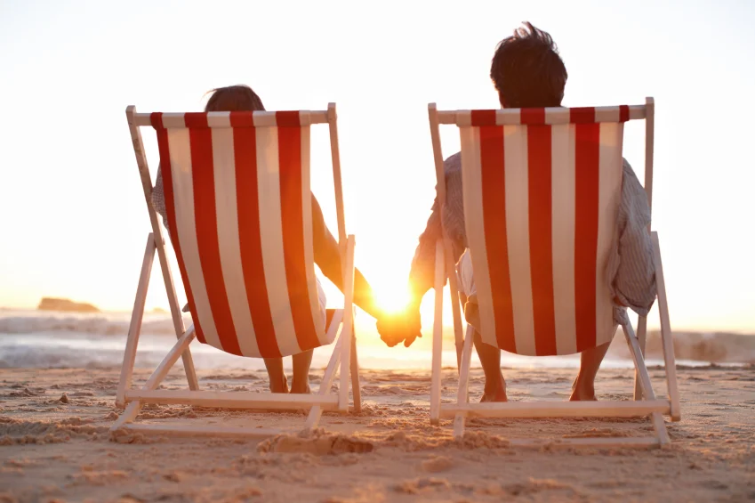 beach chairs holding hand.jpg