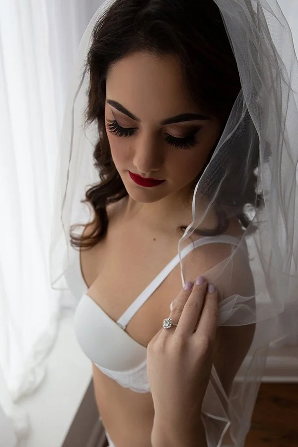 white+bridal+boudoir+of+dark-haired+woman+in+red+lipstick.jpeg
