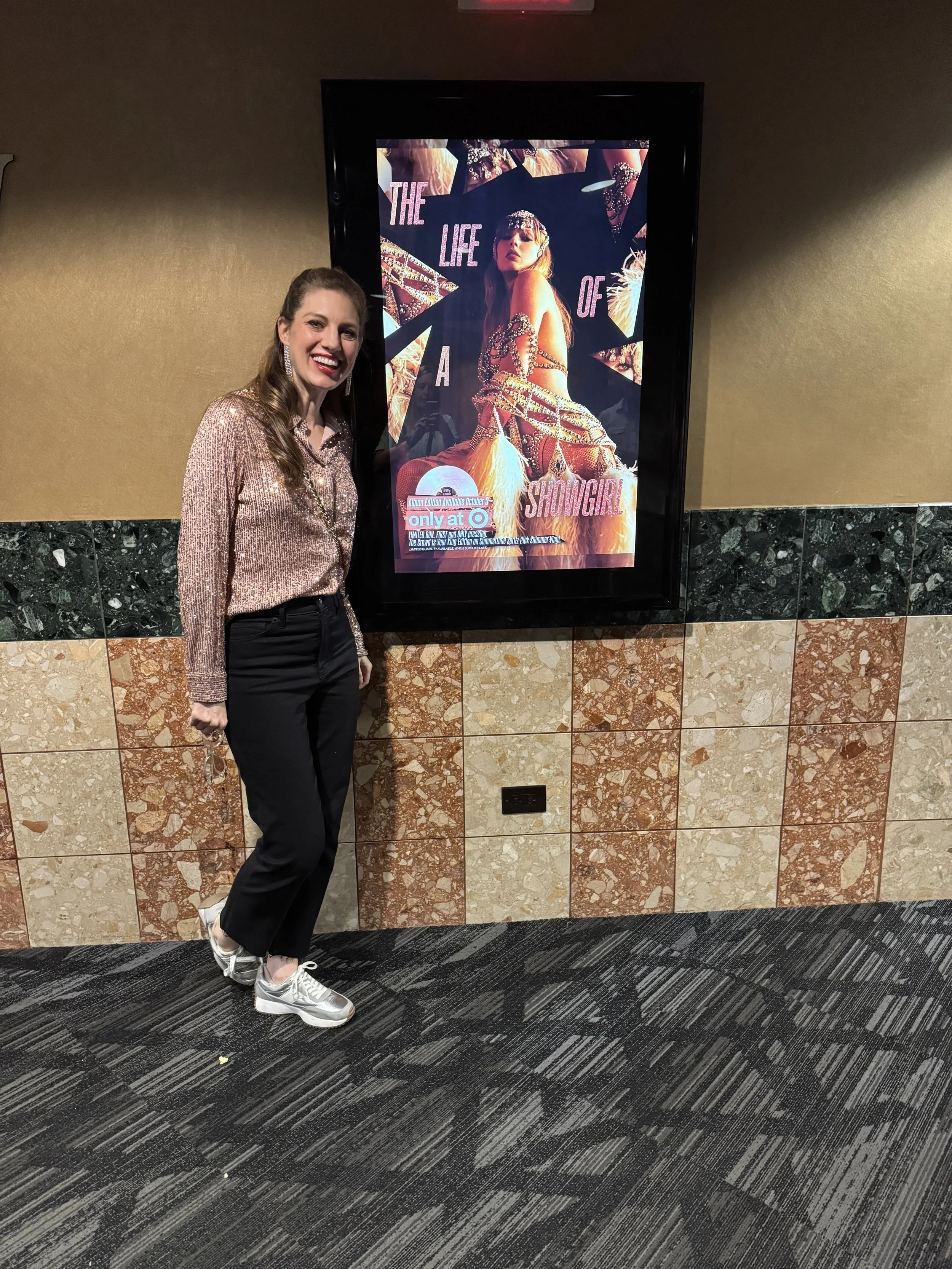 Liz Hansen at the Taylor Swift "Life of a Showgirl" album release party in the movie theater