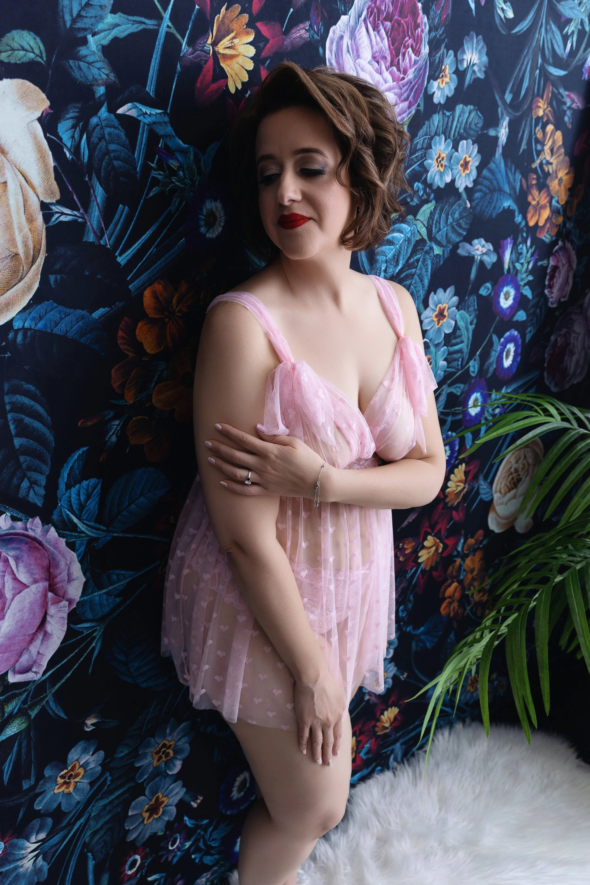 Beautiful boudoir portrait of a mom showing confidence and self-love