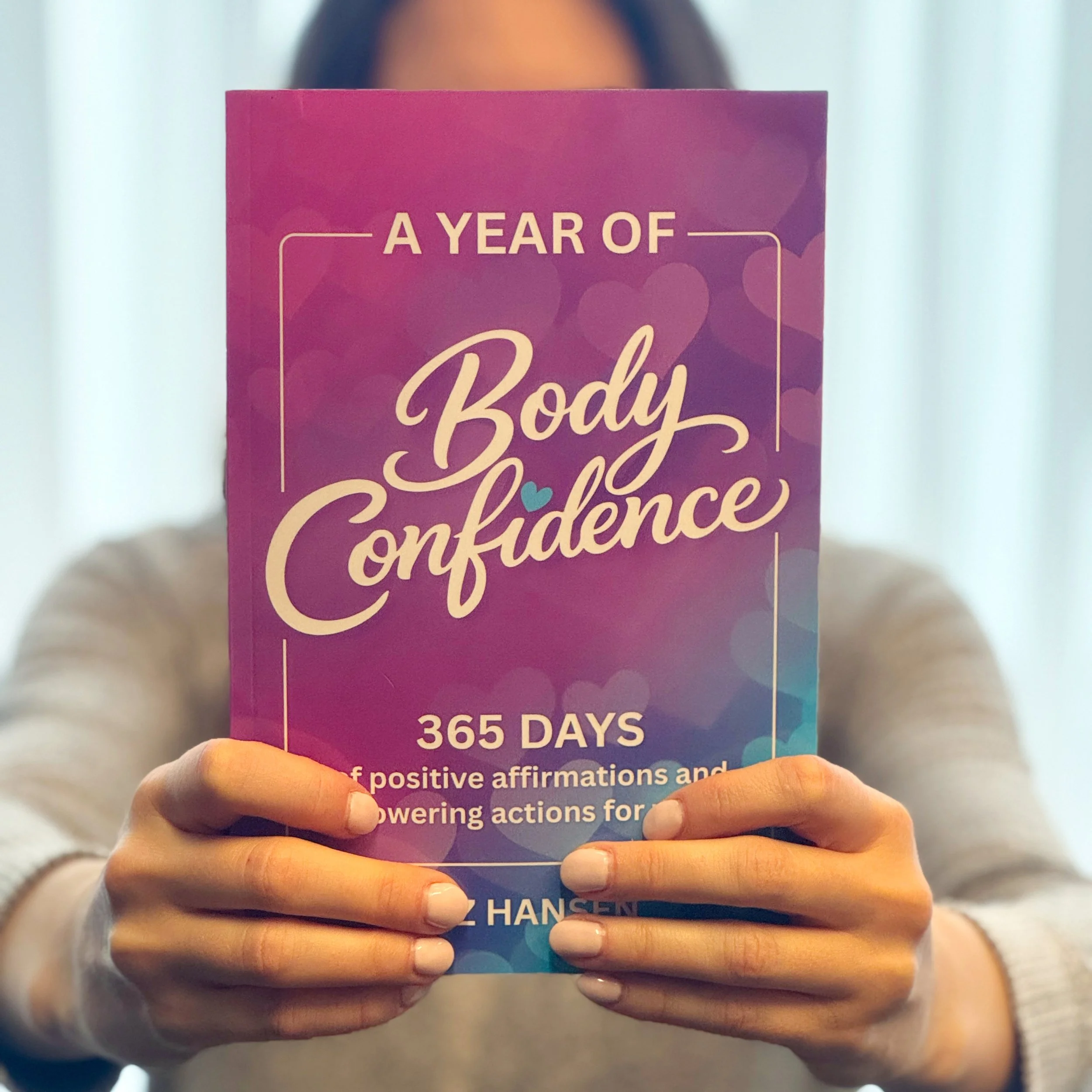 Liz Hansen presenting her book A Year of Body Confidence: 365 Days of Positive Affirmations and Empowering Actions for Women