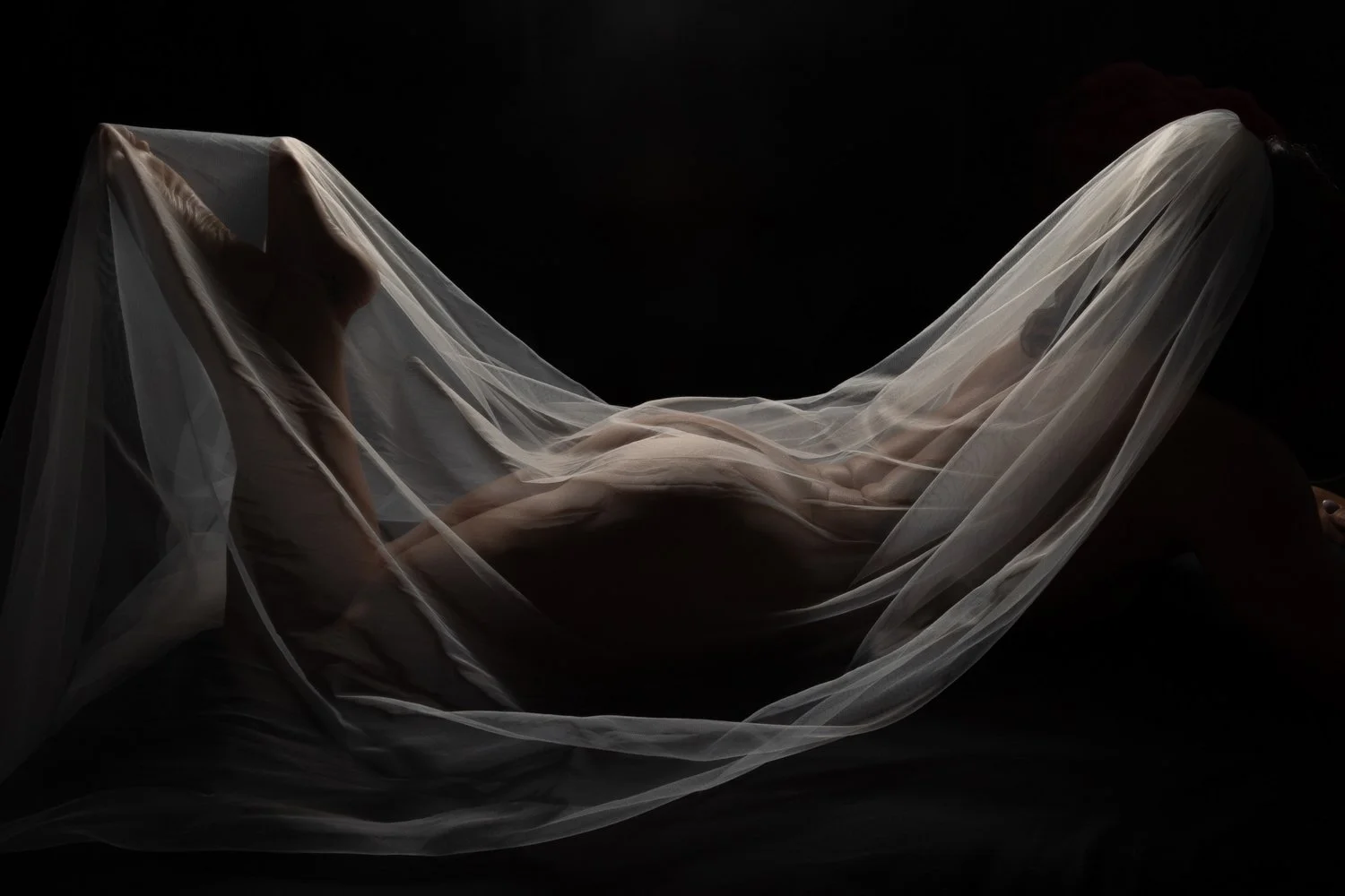 Woman posing during a Chicago bridal boudoir photoshoot