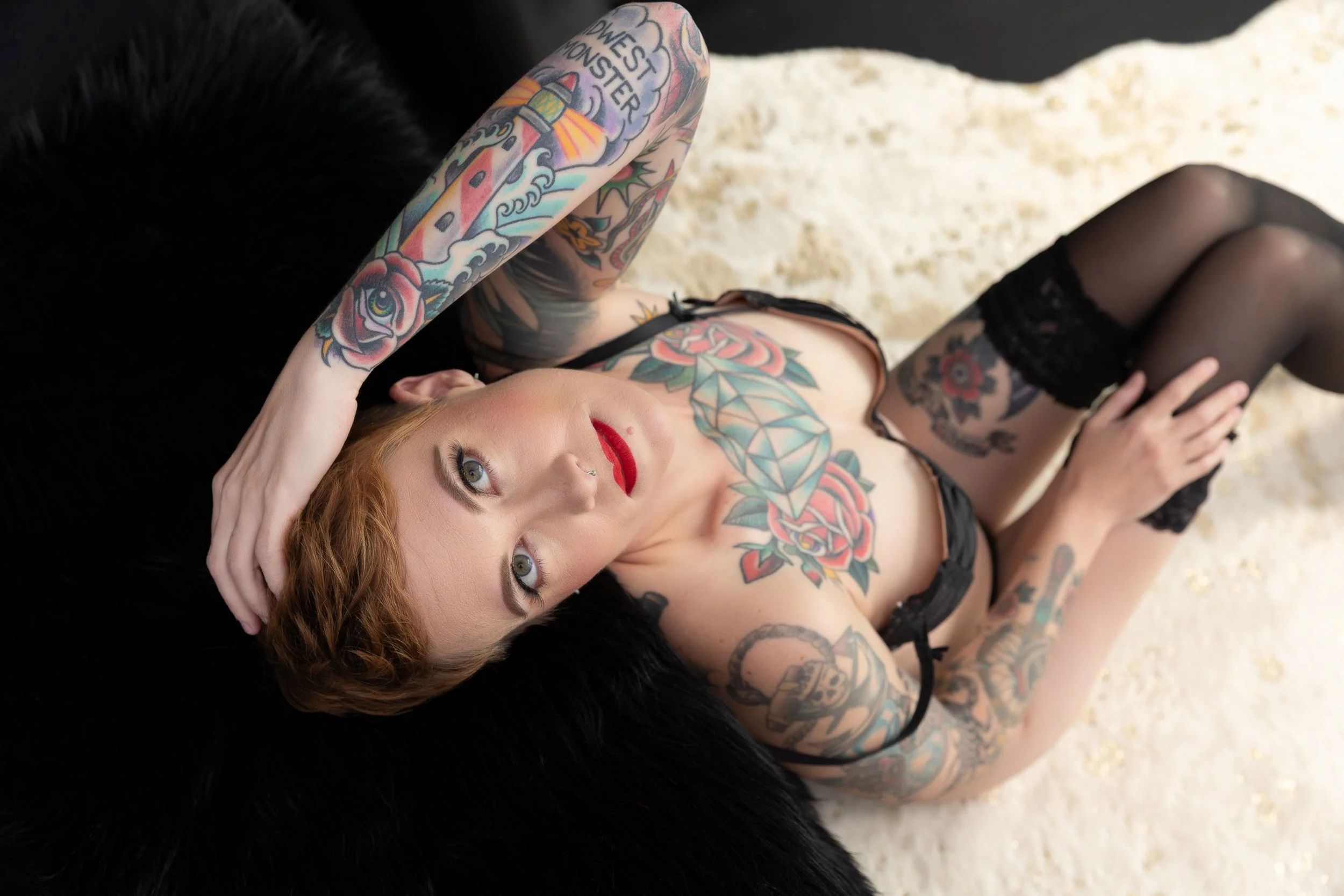 Edgy and sophisticated boudoir photo of woman with pixie haircut