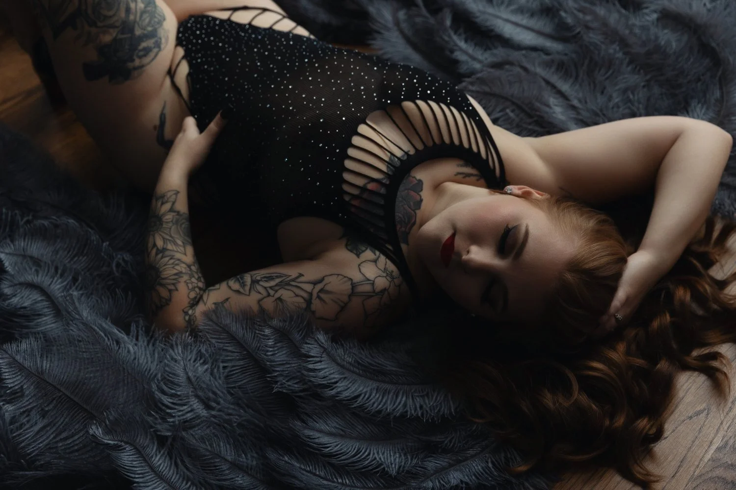 Woman posing in lingerie during a boudoir photography session