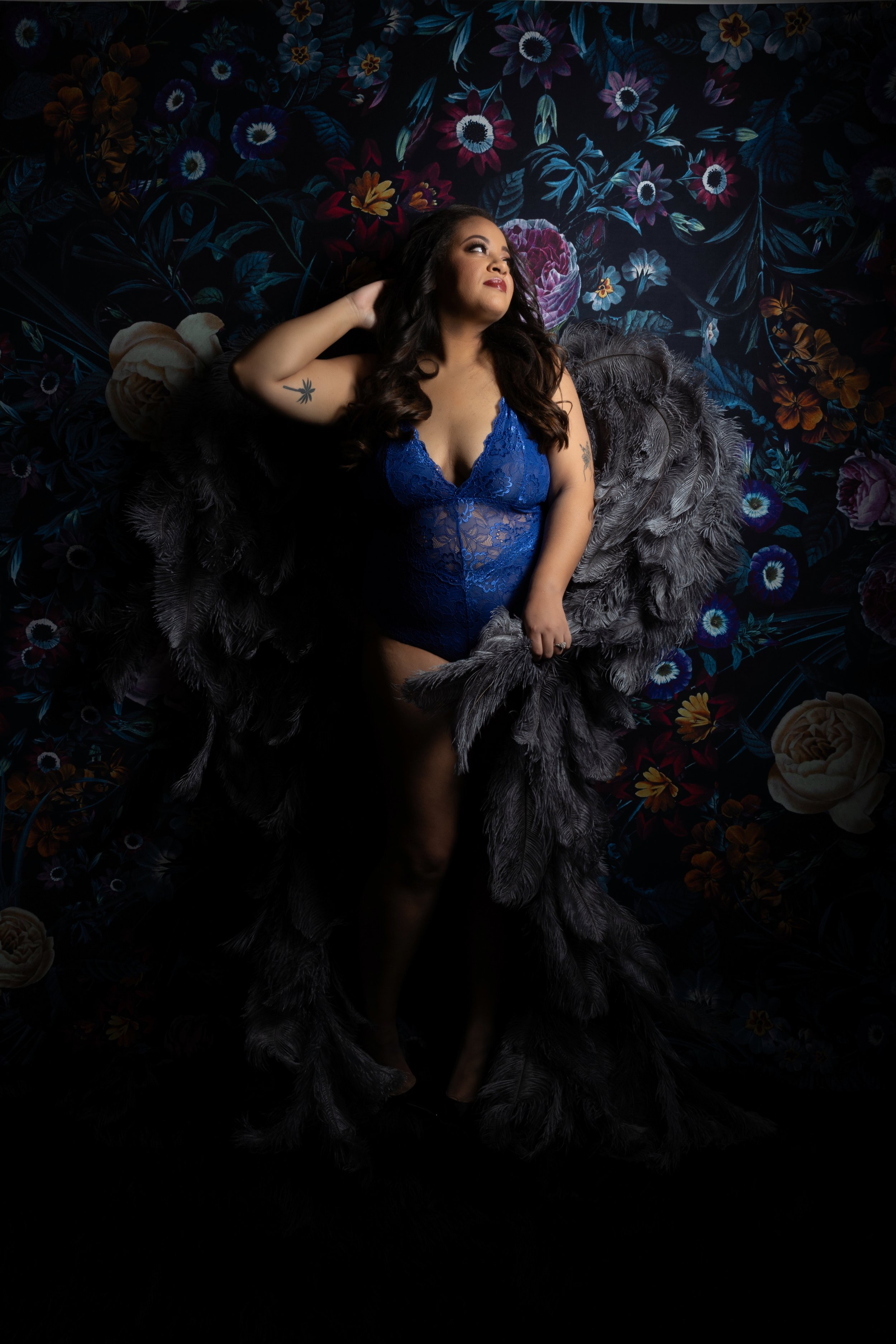 Plus-size boudoir photography session celebrating curves at Chicago Boudoir Photography