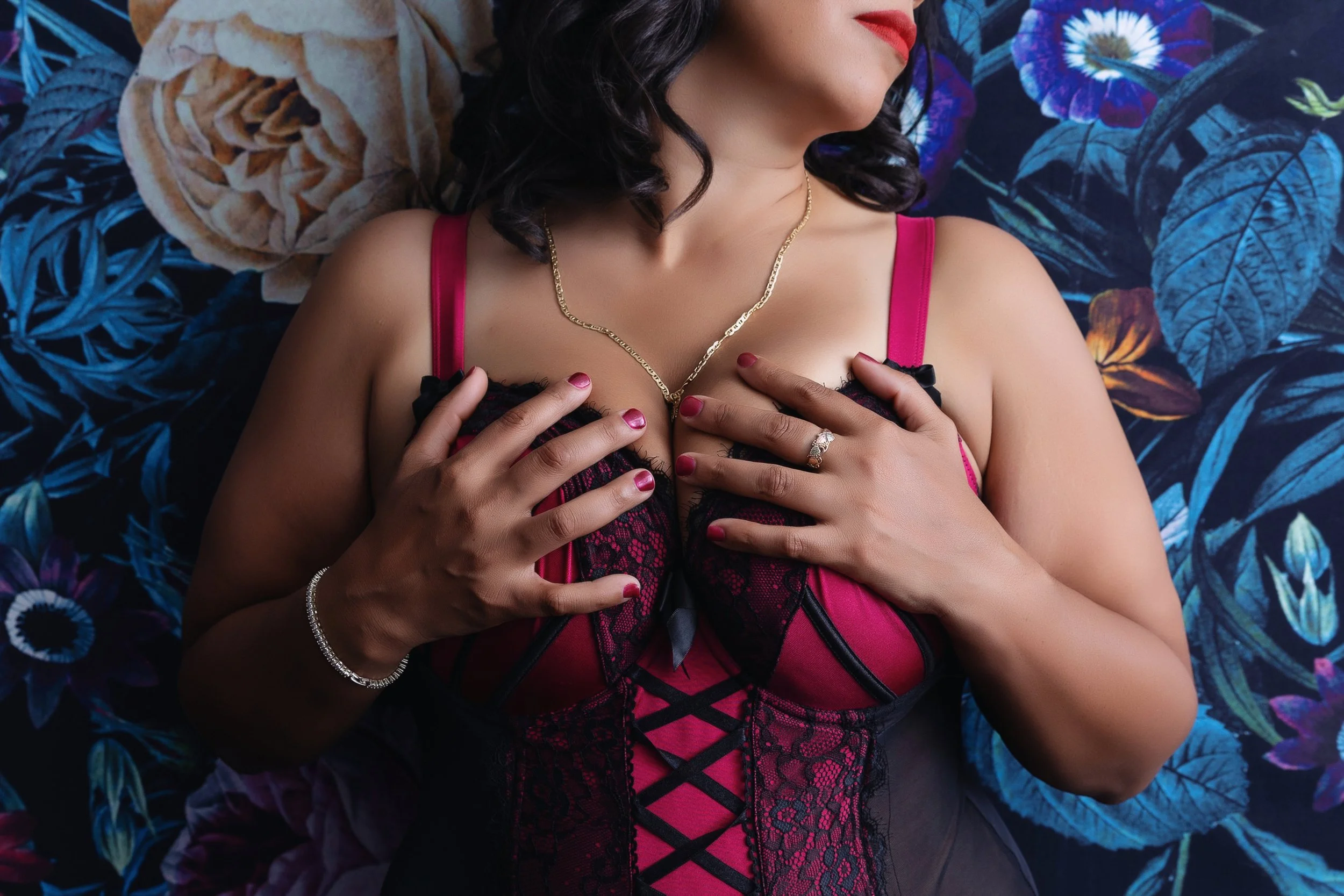 Tasteful boudoir portrait of a woman embracing her confidence while single.