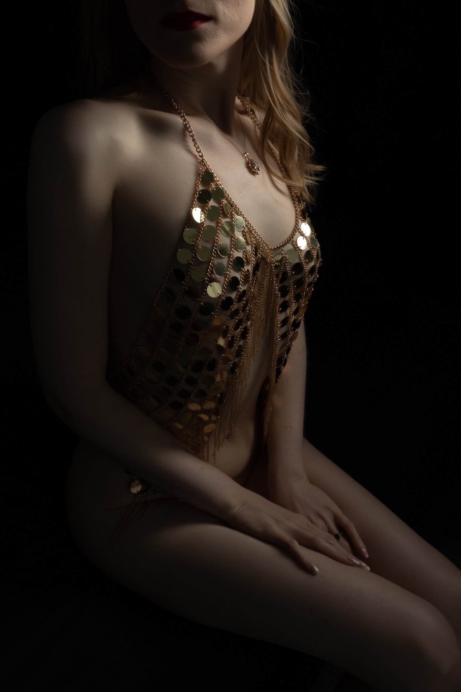 Artistic boudoir session focusing on form, light, and tasteful self-expression.