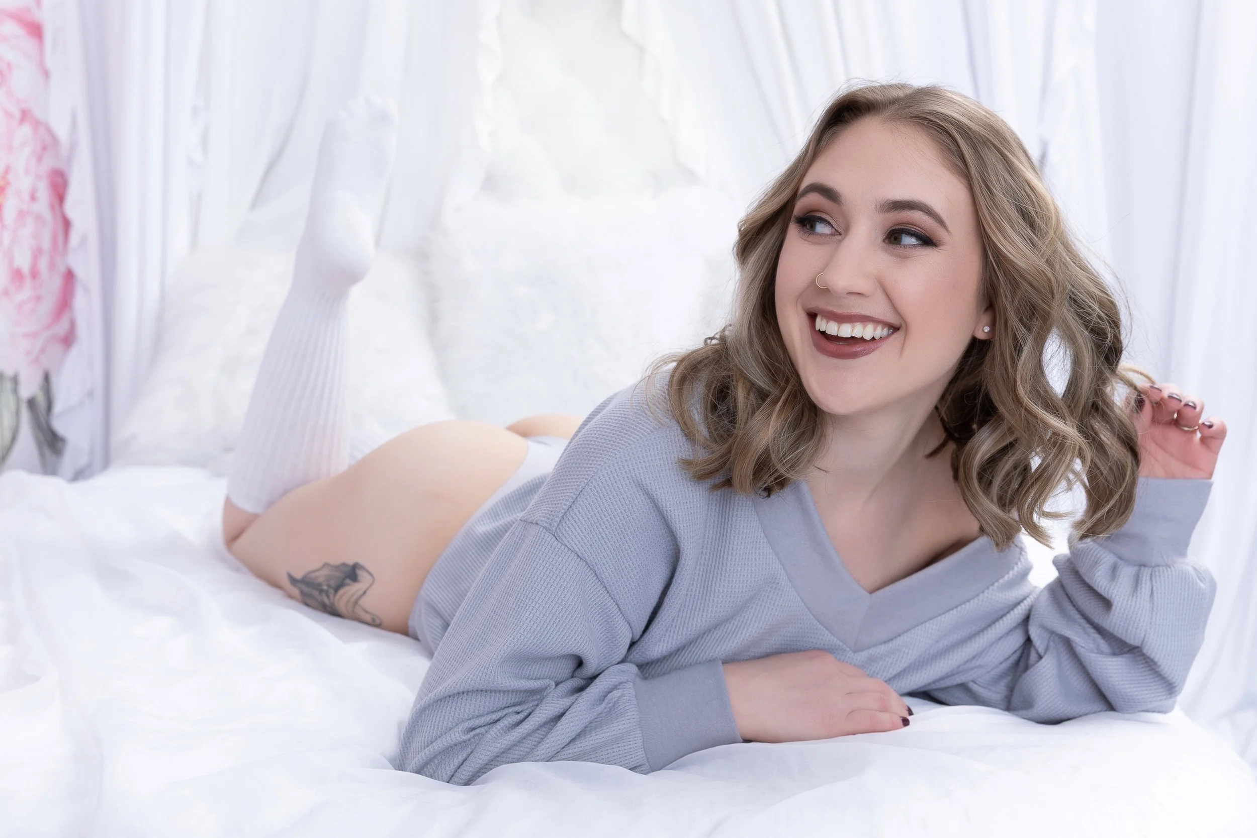 Woman posing as Aquarius zodiac, representing individuality and flow