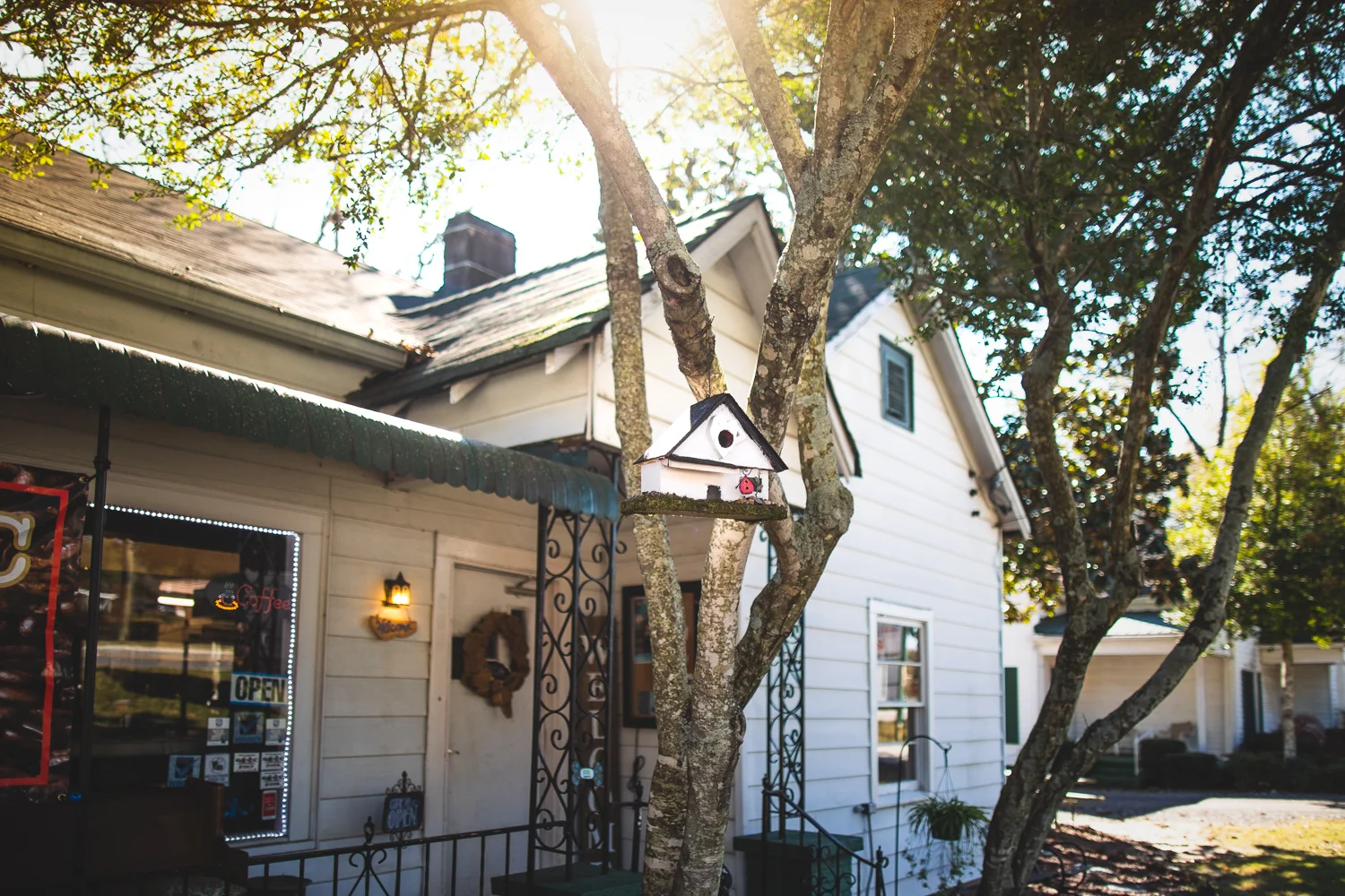 Exterior of Grayson Coffee House. Note the little birdhouse up front.