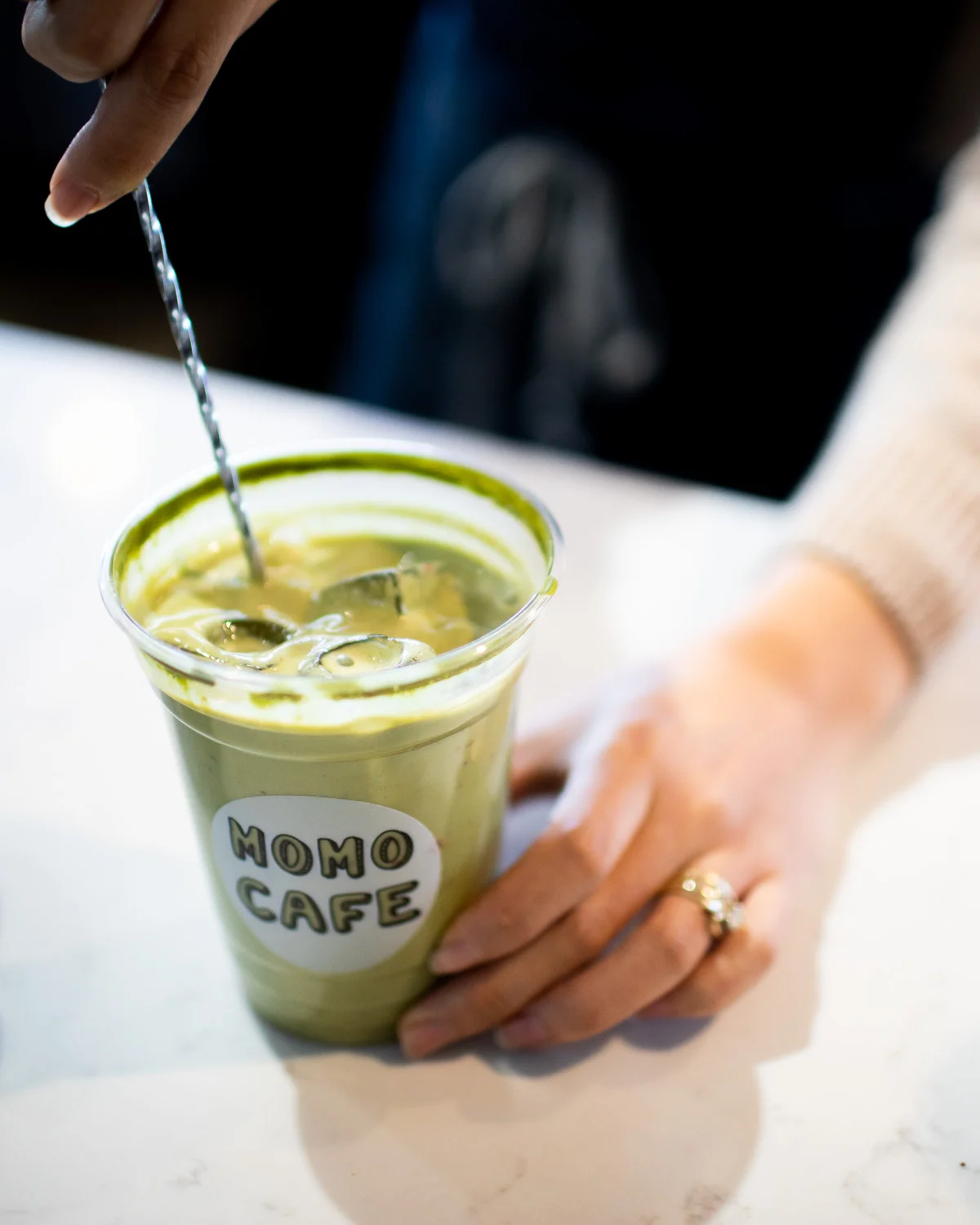 The strawberry matcha latte after mixing.