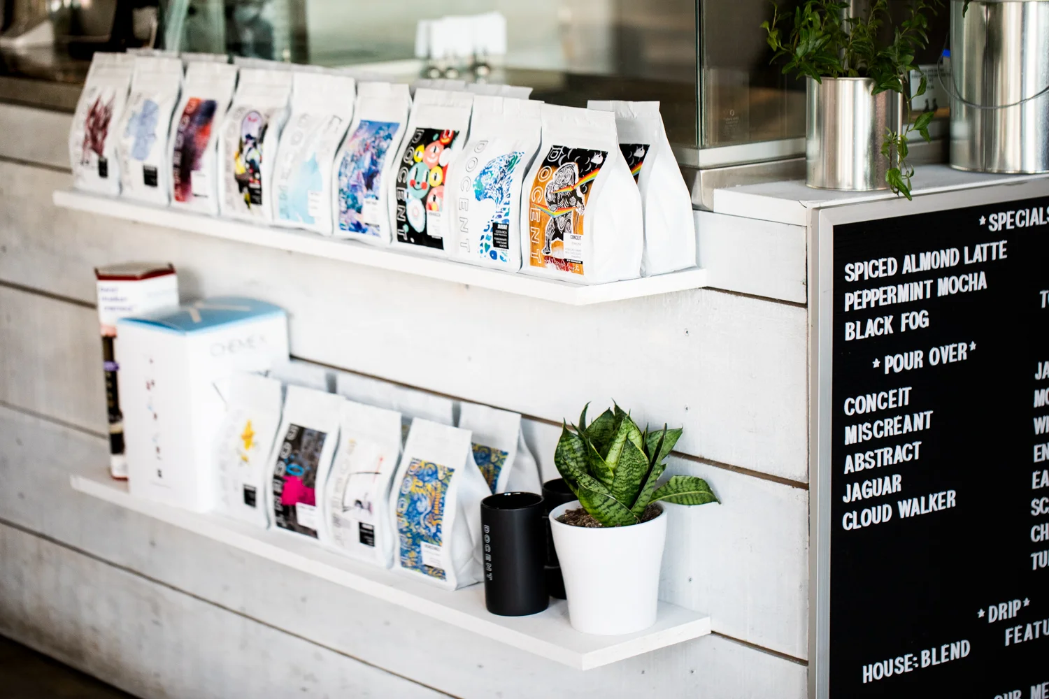 Interior design of Docent Coffee. The coffees seen on the two shelves are profiled in this section .
