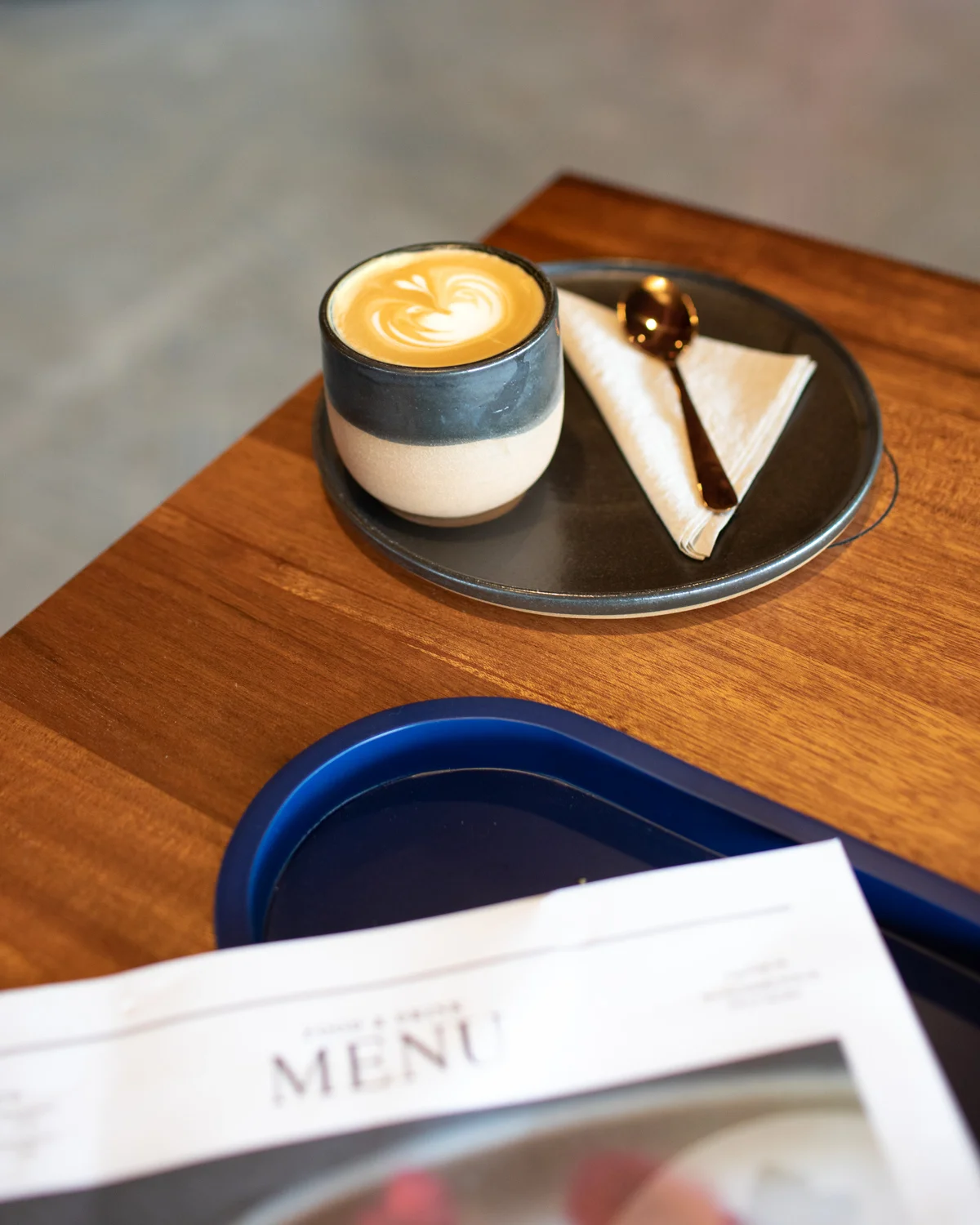 A cappuccino at Cold Brew Bar. The ceramic cups at Cold Brew Bar are from ceramic artist named Isabel Glatthorn ( Soul Matter Studio ).