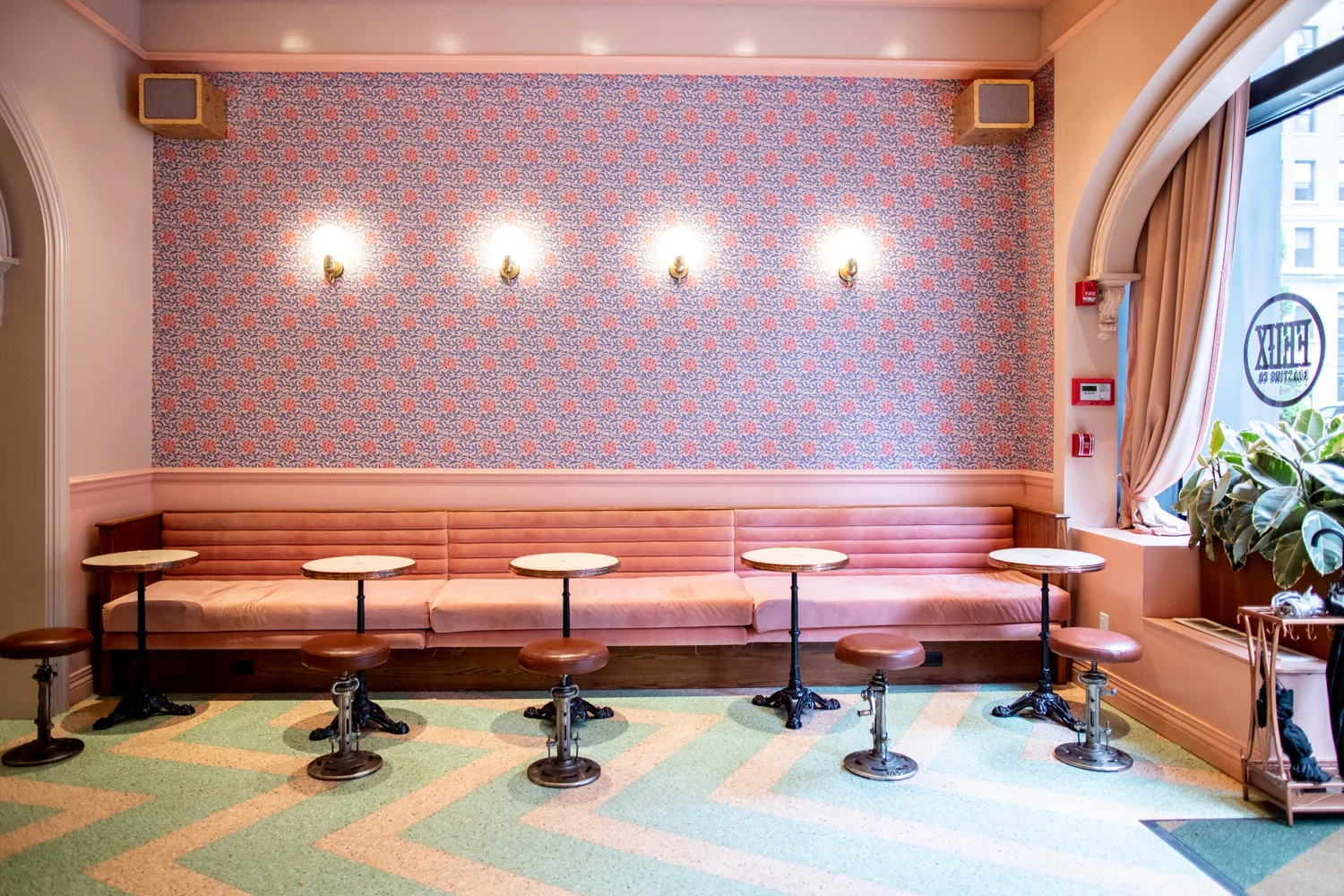 Another view of “The Hall” at Felix Roasting Co. Note that the hand-painted wallpaper in the back features the flower of the Arabica plant.