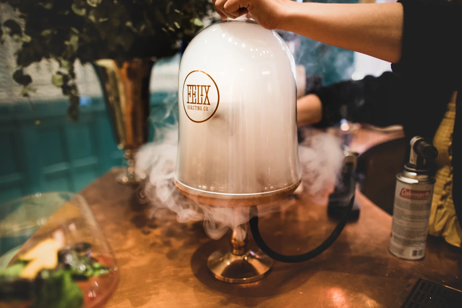 Step 3: Lift the dome of the bell jar and remove the hickory-smoked marshmallow.