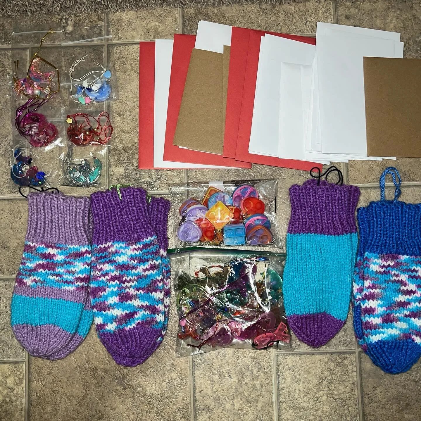 Thank you for such an outstanding market! 😍 I had 20 cards dropped off for Dube, and I&rsquo;m donating these market items in thanks of folks generosity. 40 some ornaments, 15 pop-it&rsquo;s, and 4 mittens!  If you&rsquo;d like to bring a donation t