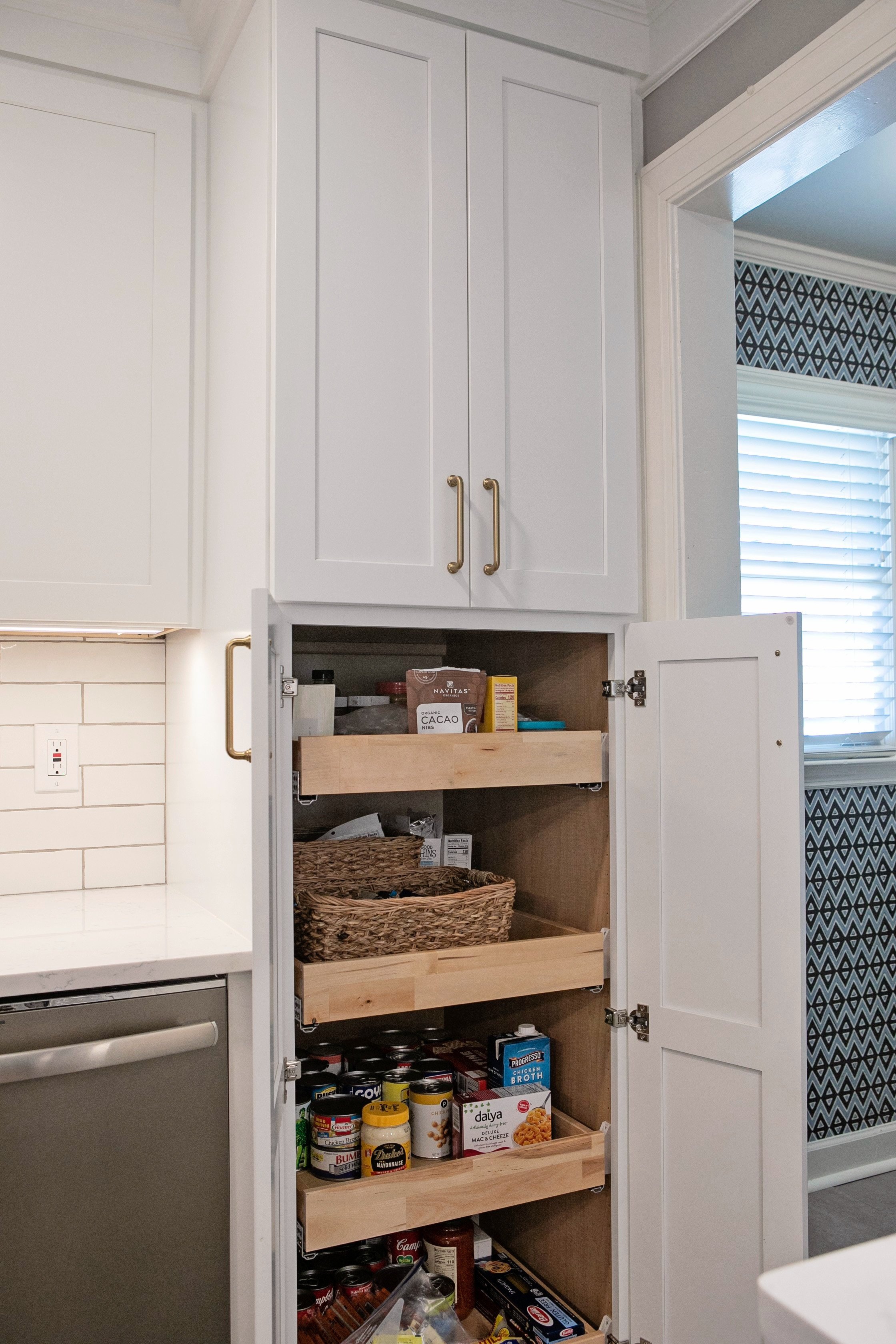 Pull-out shelves in pantry cabinet