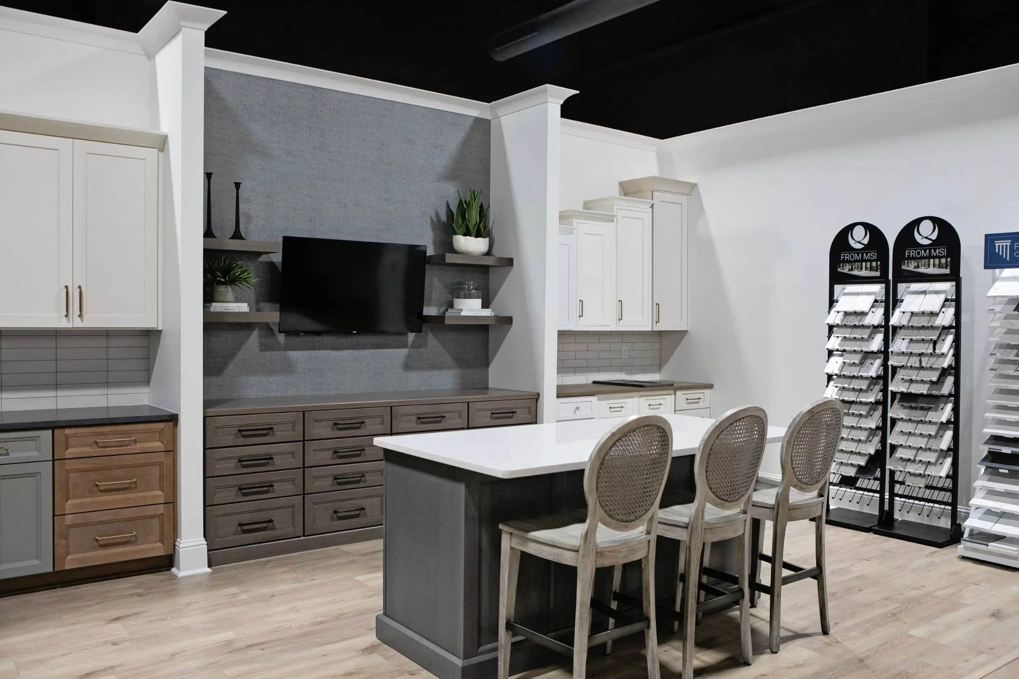 Kitchen and cabinetry displays inside the Pool Brothers showroom in Greensboro, Georgia featuring custom cabinets, countertops, flooring, and design inspiration.