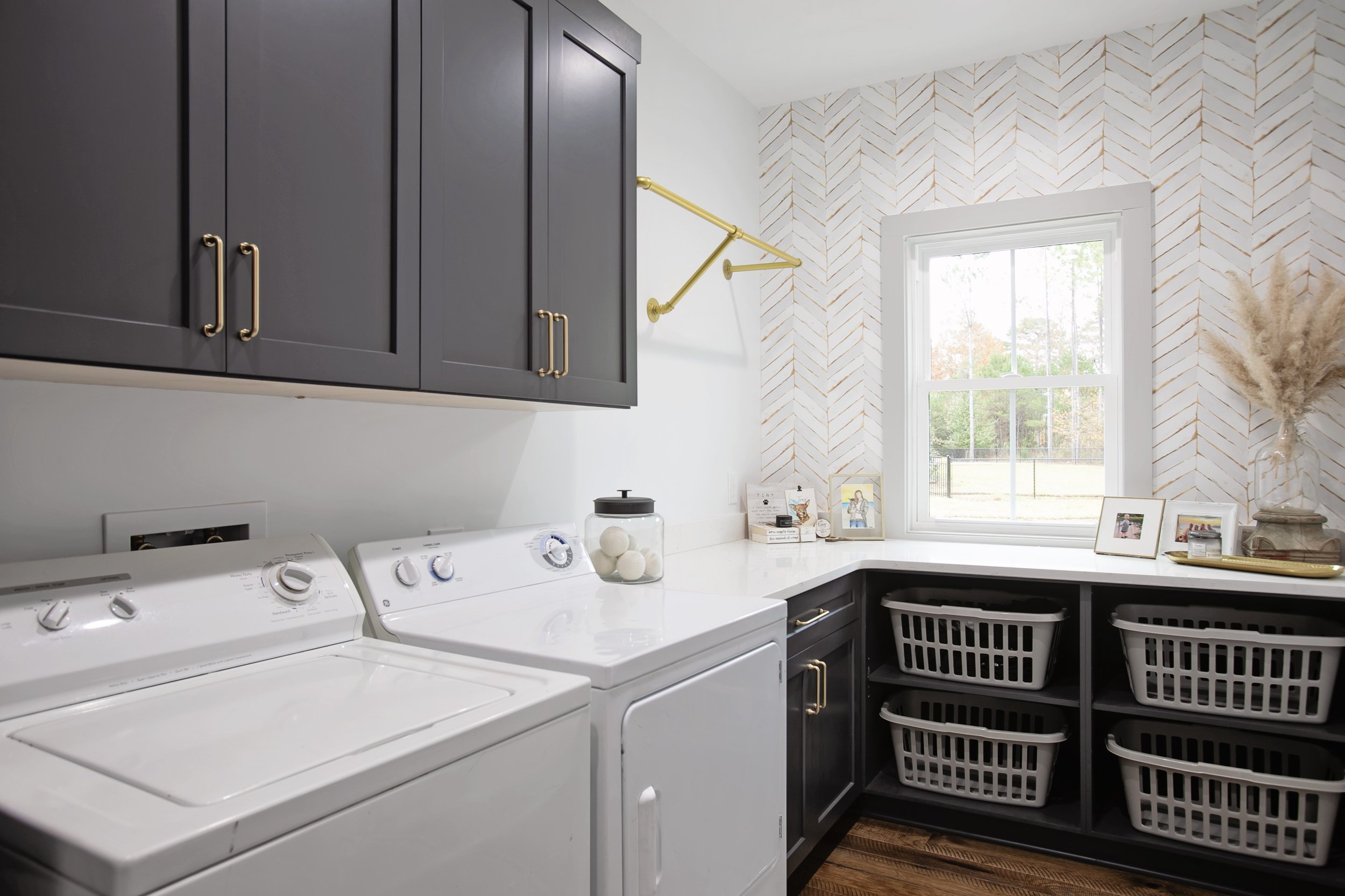 Laundry Room Cabinetry by Pool Brothers Cabinets + Flooring + Lighting