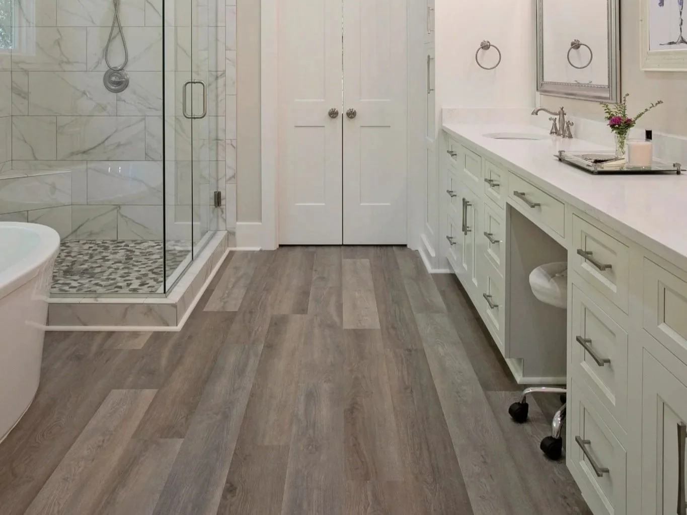 Luxury vinyl flooring in a master bathroom located in Americus, GA.