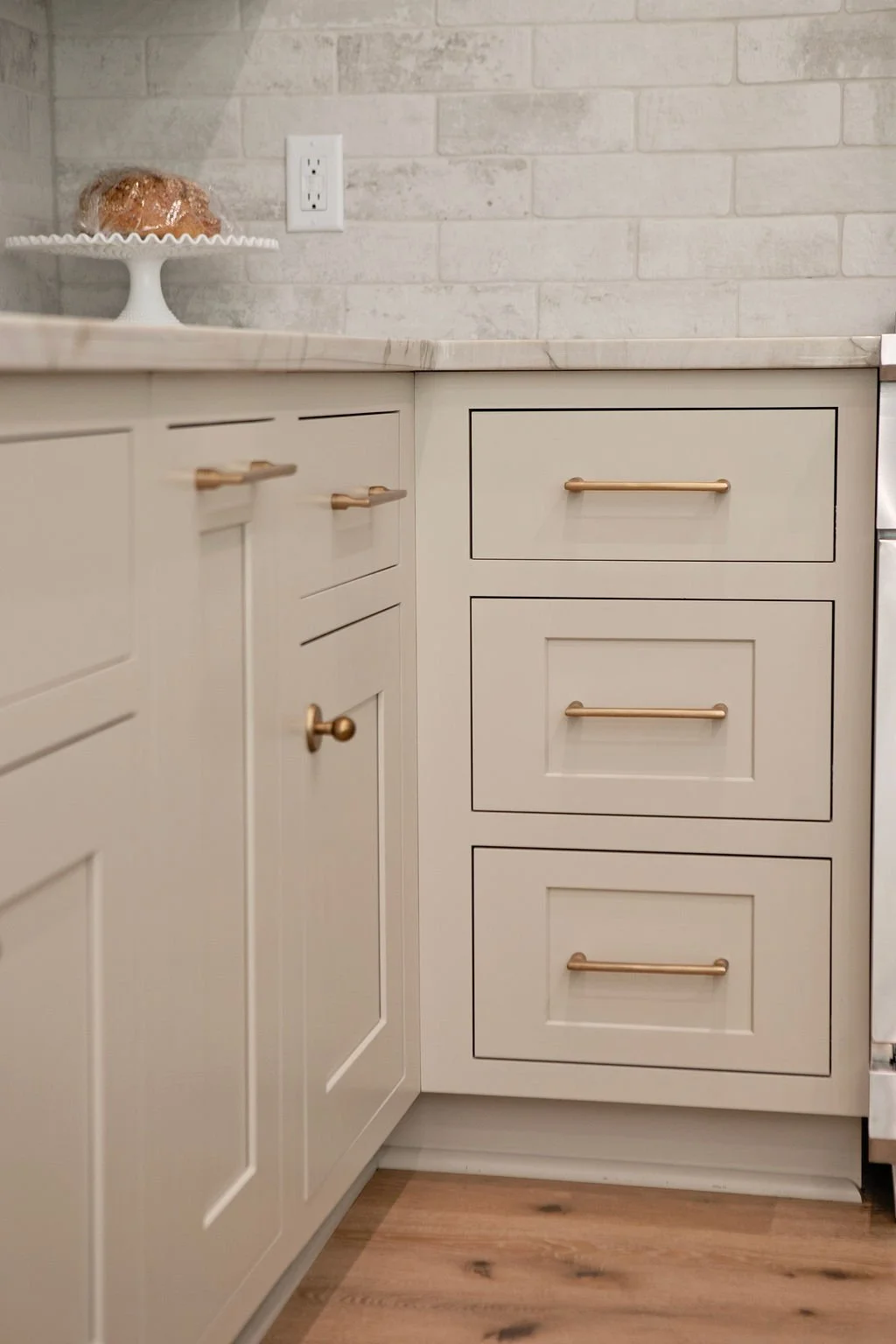 Corner Cabinet Detail with Brass Hardware