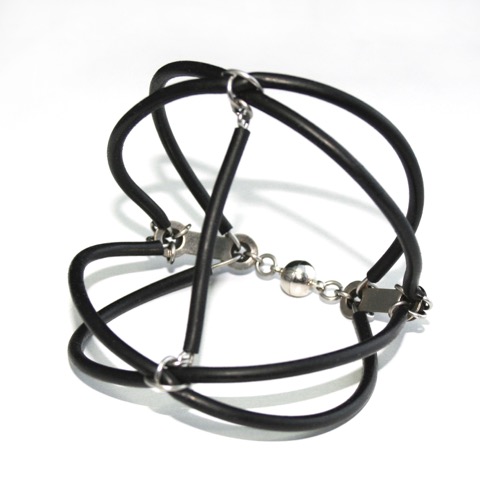 (wired) I design handmade wearable artwork entirely from reclaimed and surplus industrial material. Salvaging components such as colorful alternator wire, tubing, and transistors, I fashion one-of-a-kind and limited edition works. The color, texture, and malleability of the found materials guide the design of each piece and foster different compositional challenges than traditional materials — Melissa Kolbusz www.wiredresistance.com