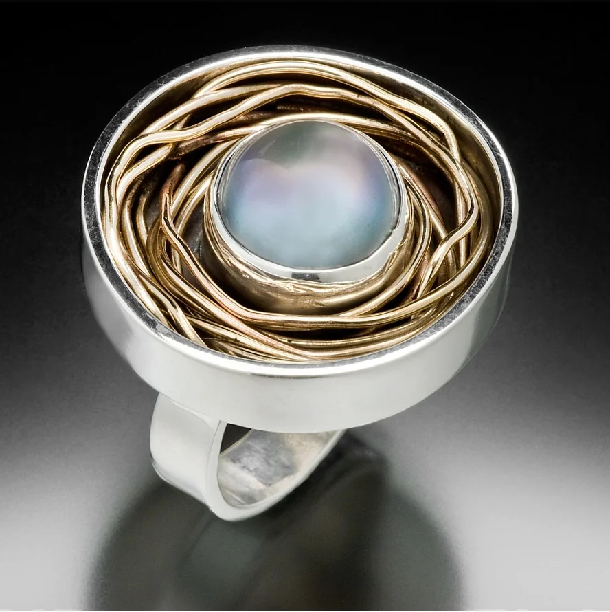 Sara Lenart Jewelry Design I was that kid playing with wire and beads and that high school student metal-smithing in the art studio so it was only natural for me to pursue my dream: making my living as a jewelry designer. After earning my Graduate Gemologist degree from GIA, I started collecting all my tools of natural stones, wood, found objects and vintage finds, dreaming up designs, and hand-crafting each piece myself in my Chicago studio. – Sara Lenart Website: http://www.saralenart.com