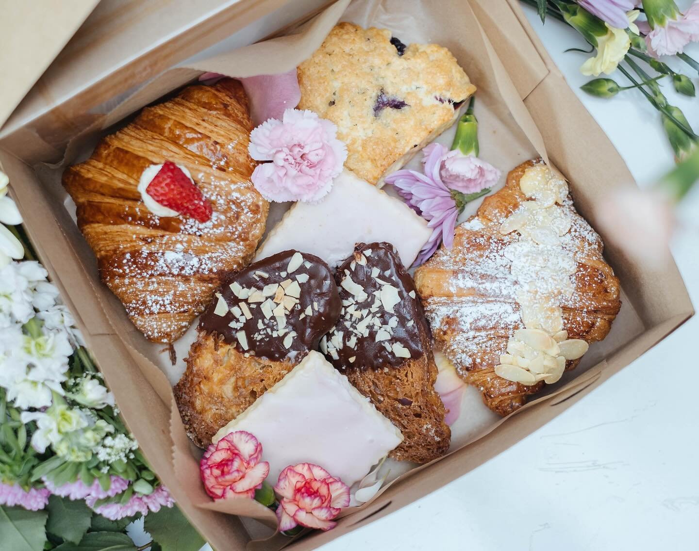 💕 Mothers&rsquo; Day PREORDERS 💐 Our online store is officially open for Mothers&rsquo; Day treats and desserts featuring some new items like our croissant biscotti and blueberry scones, and some of our holiday favorites like our macaron sets. Clic