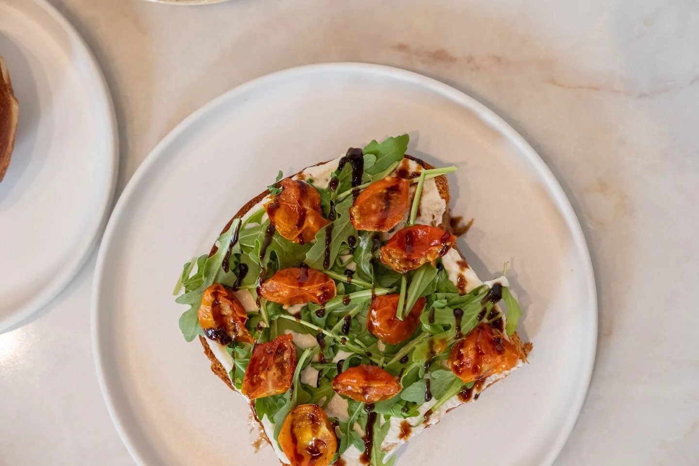 Your Monday afternoon needs a whipped ricotta roasted tomato toast at the bakehouse. 🍅