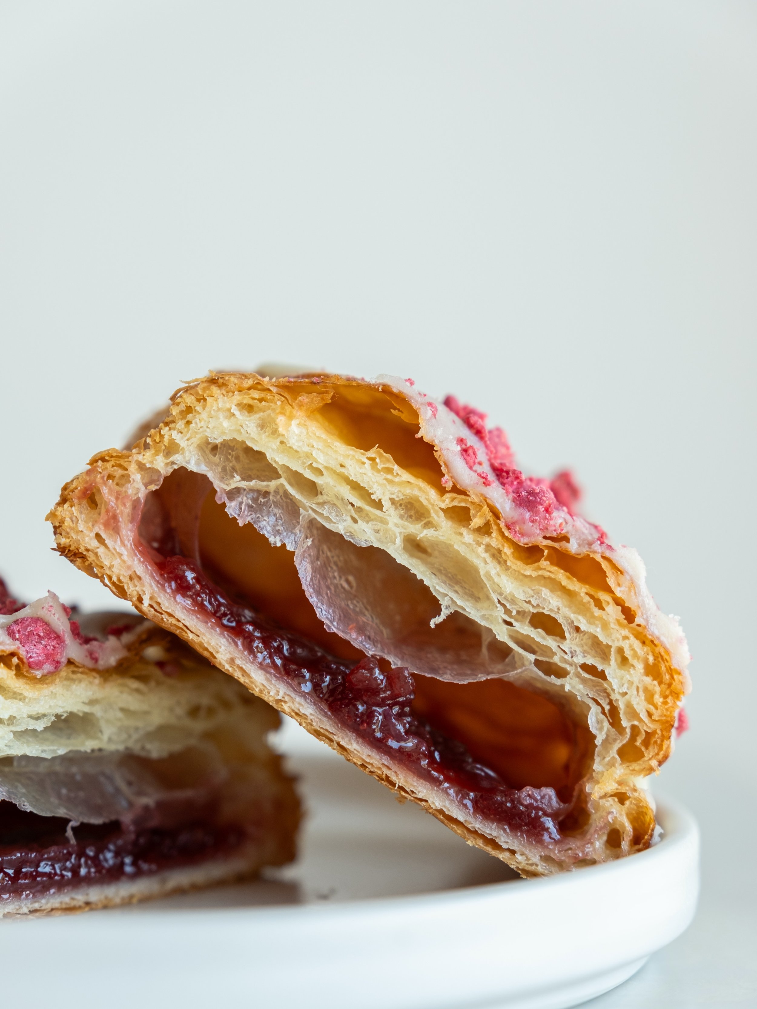 Who else grew up on pop tarts? 🙋 Our raspberry white chocolate pop-tart is giving an elevated version of the best nostalgic flavors ✨😋 McLean location only