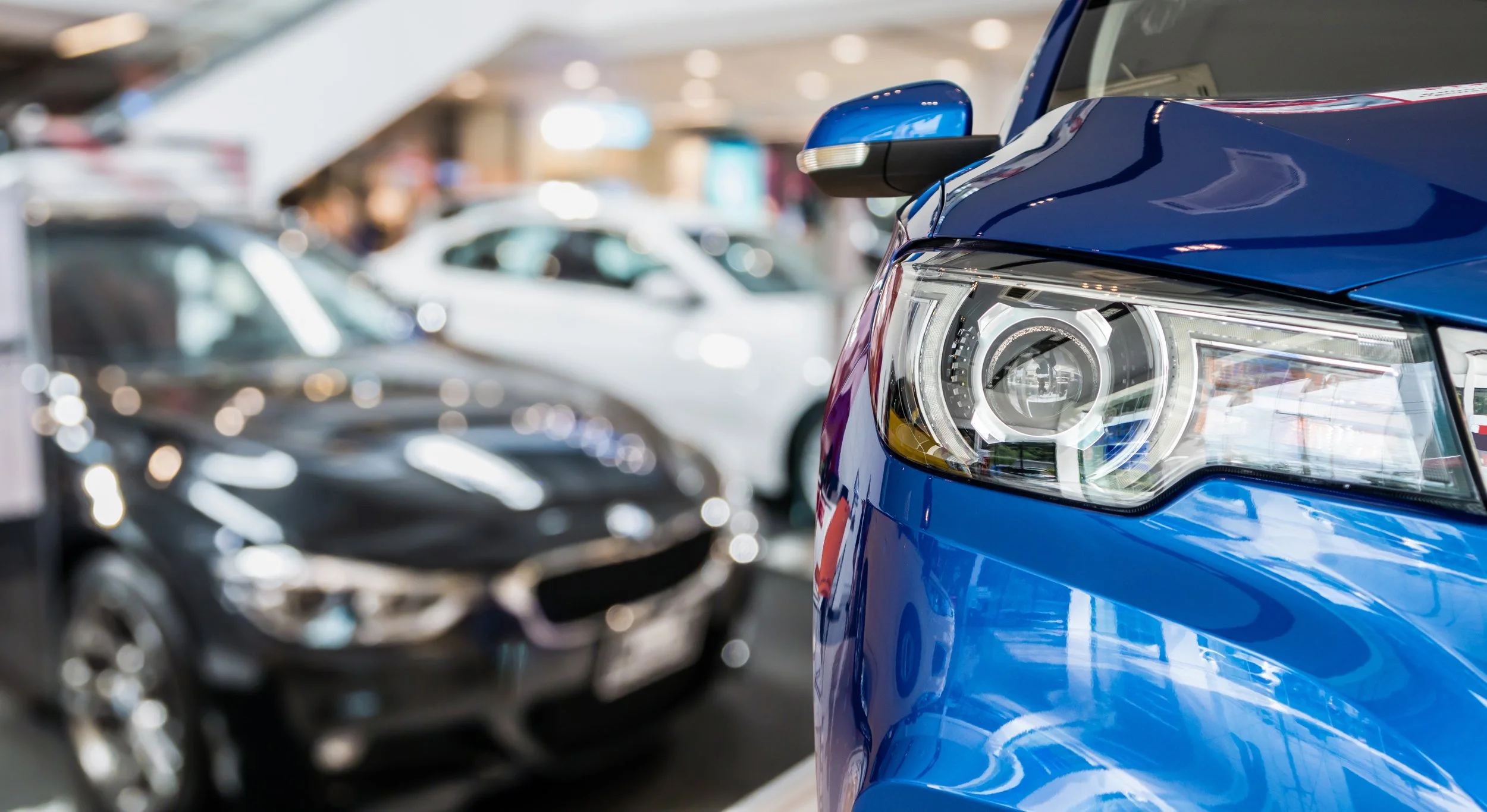 new cars in dealership showroom