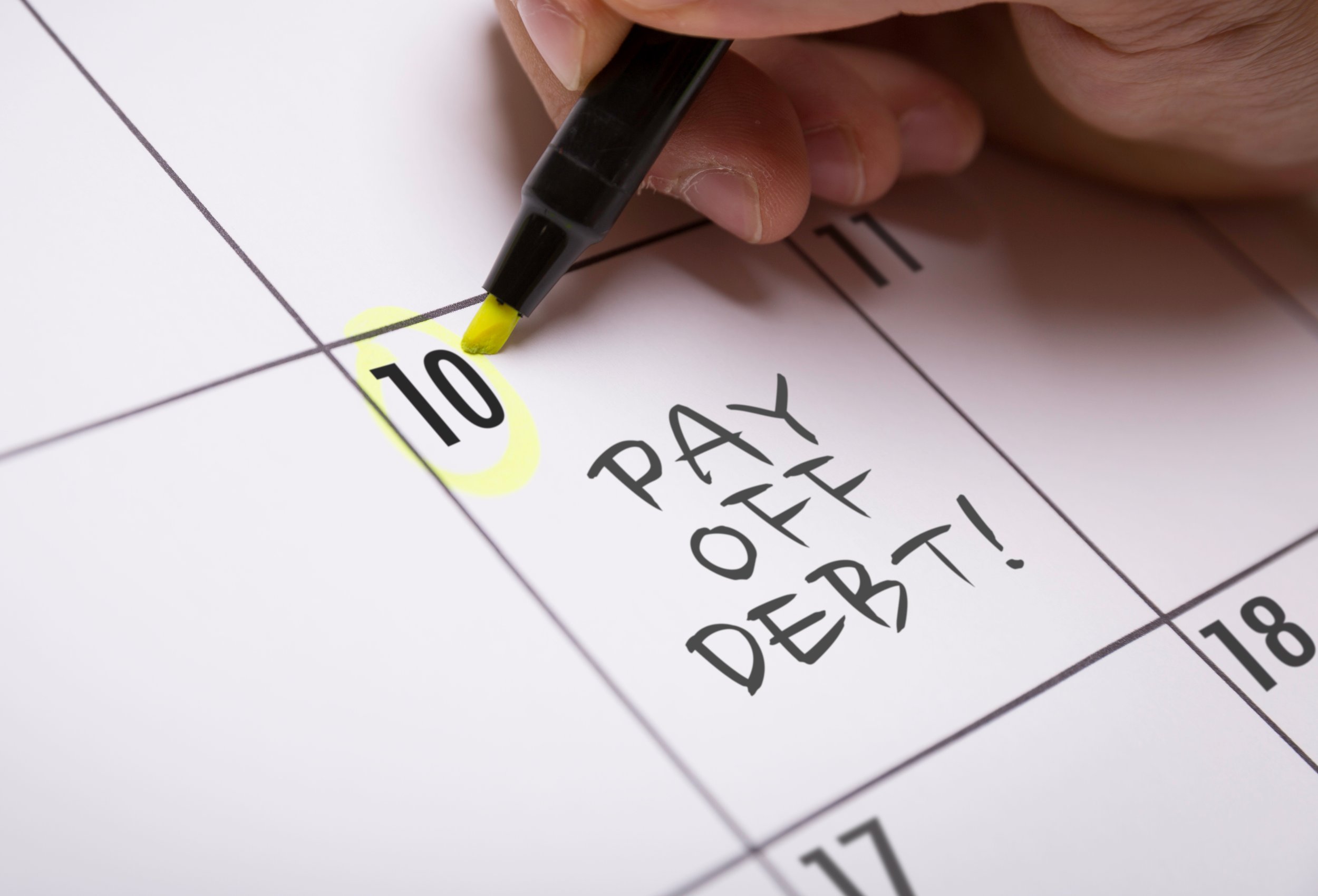 date circled on calendar to pay off debt