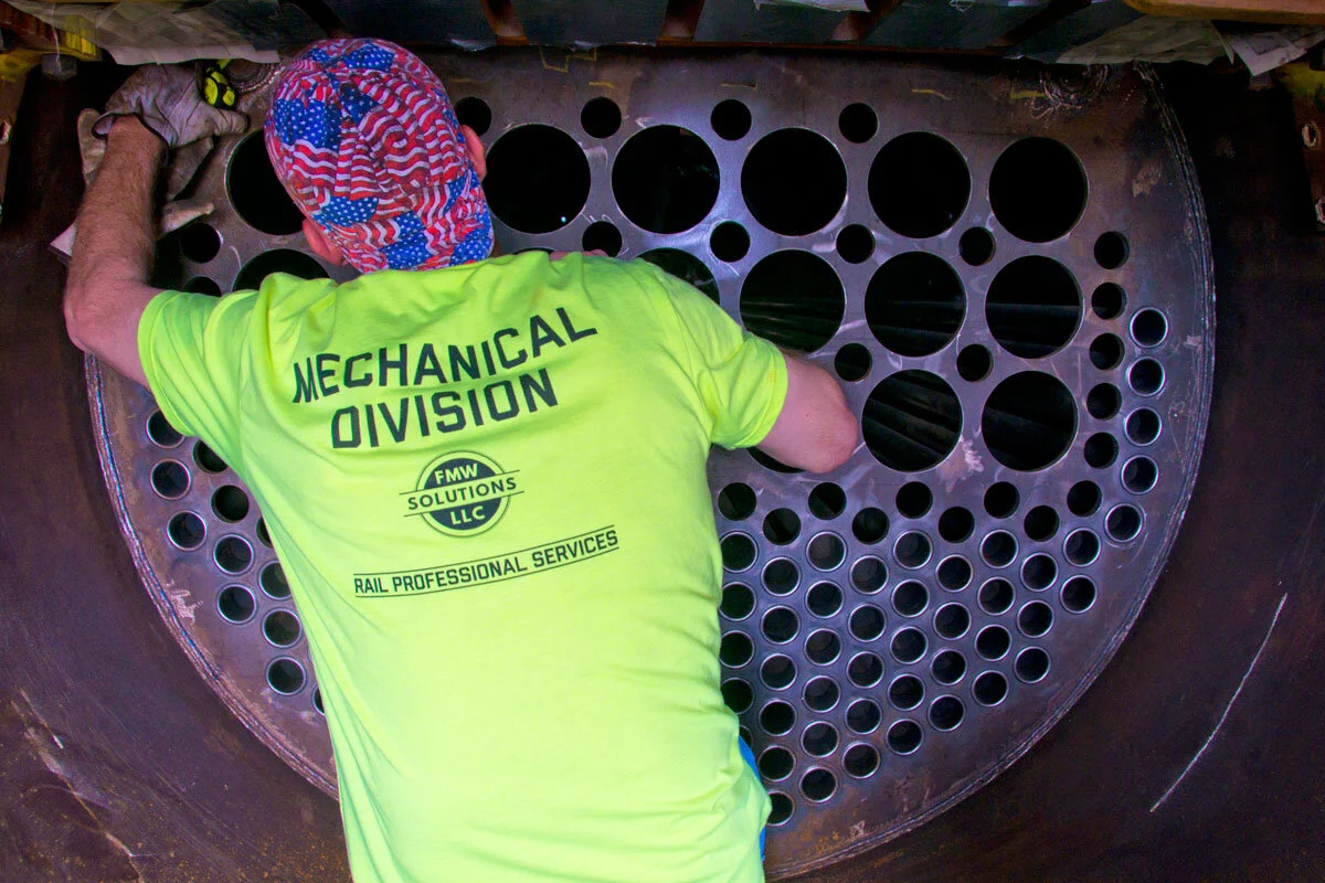 FMW VP-Mechanical Shane Meador inspects the front tube sheet of No. 148 earlier in 2019.