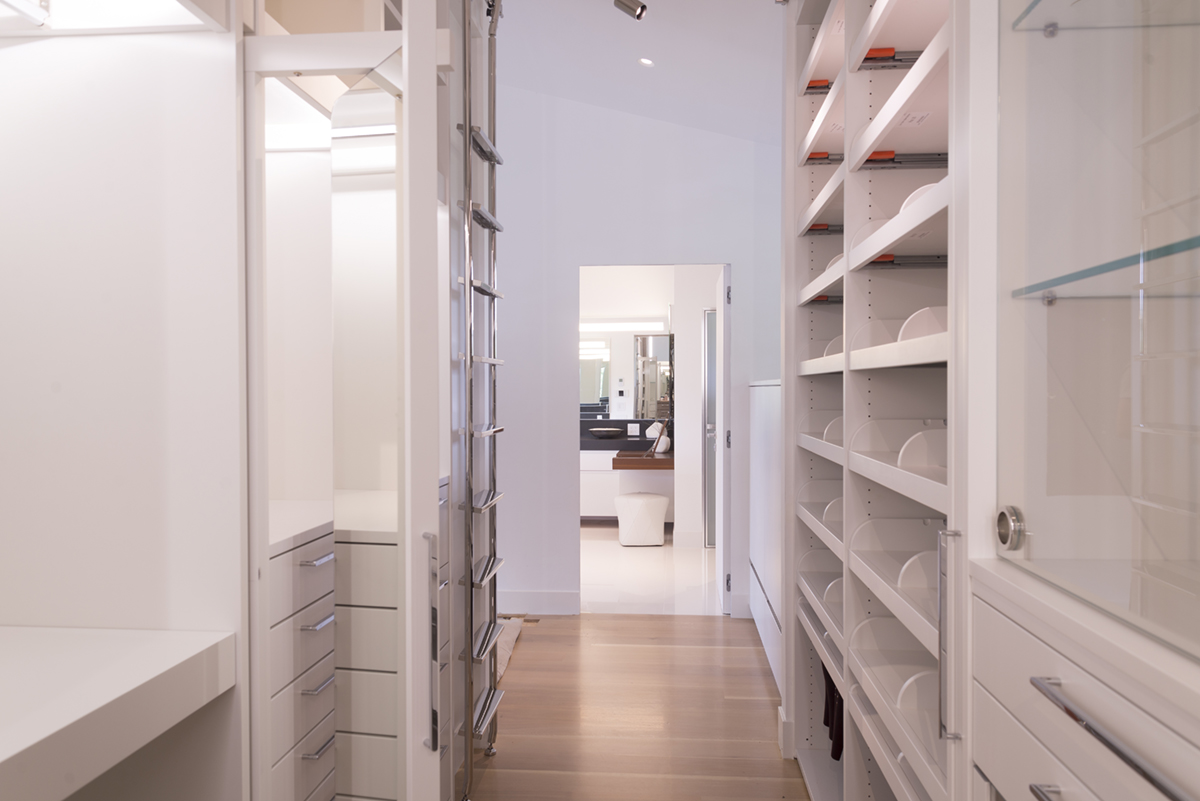 walk-in closet lacquered and light wood
