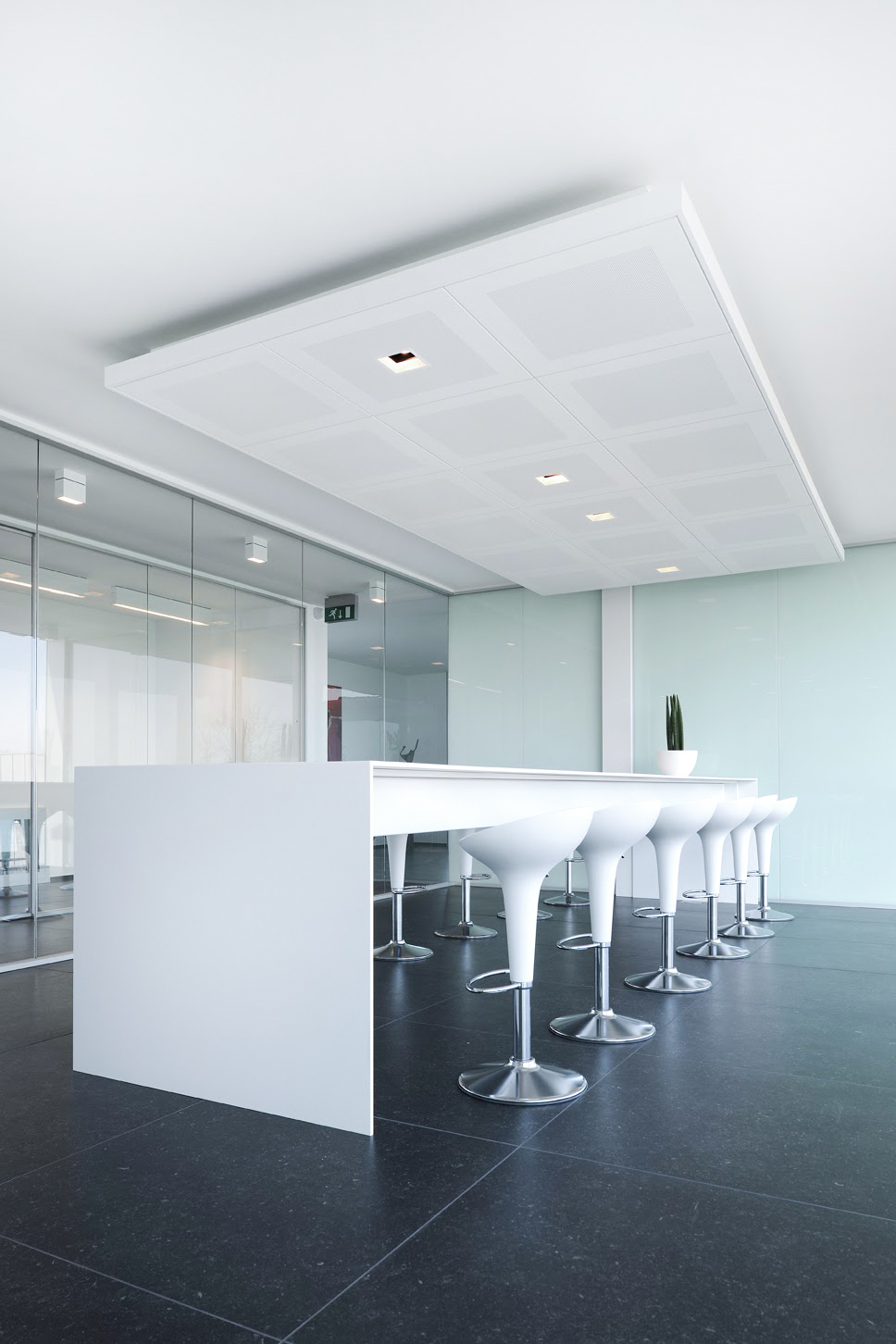 white coworking table with white barstools