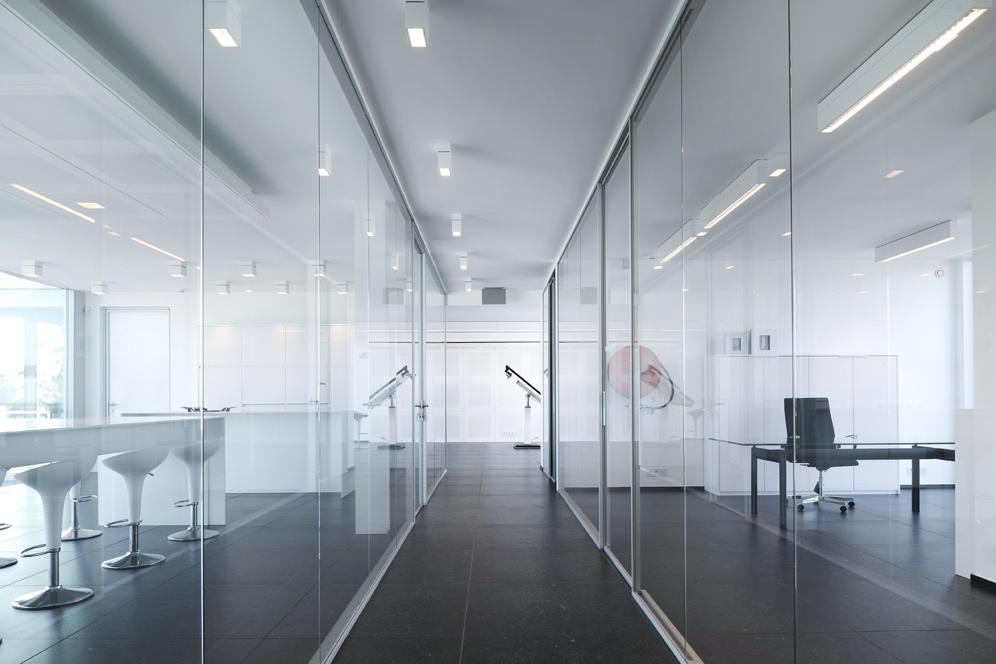 modern office hallway with big glass windows