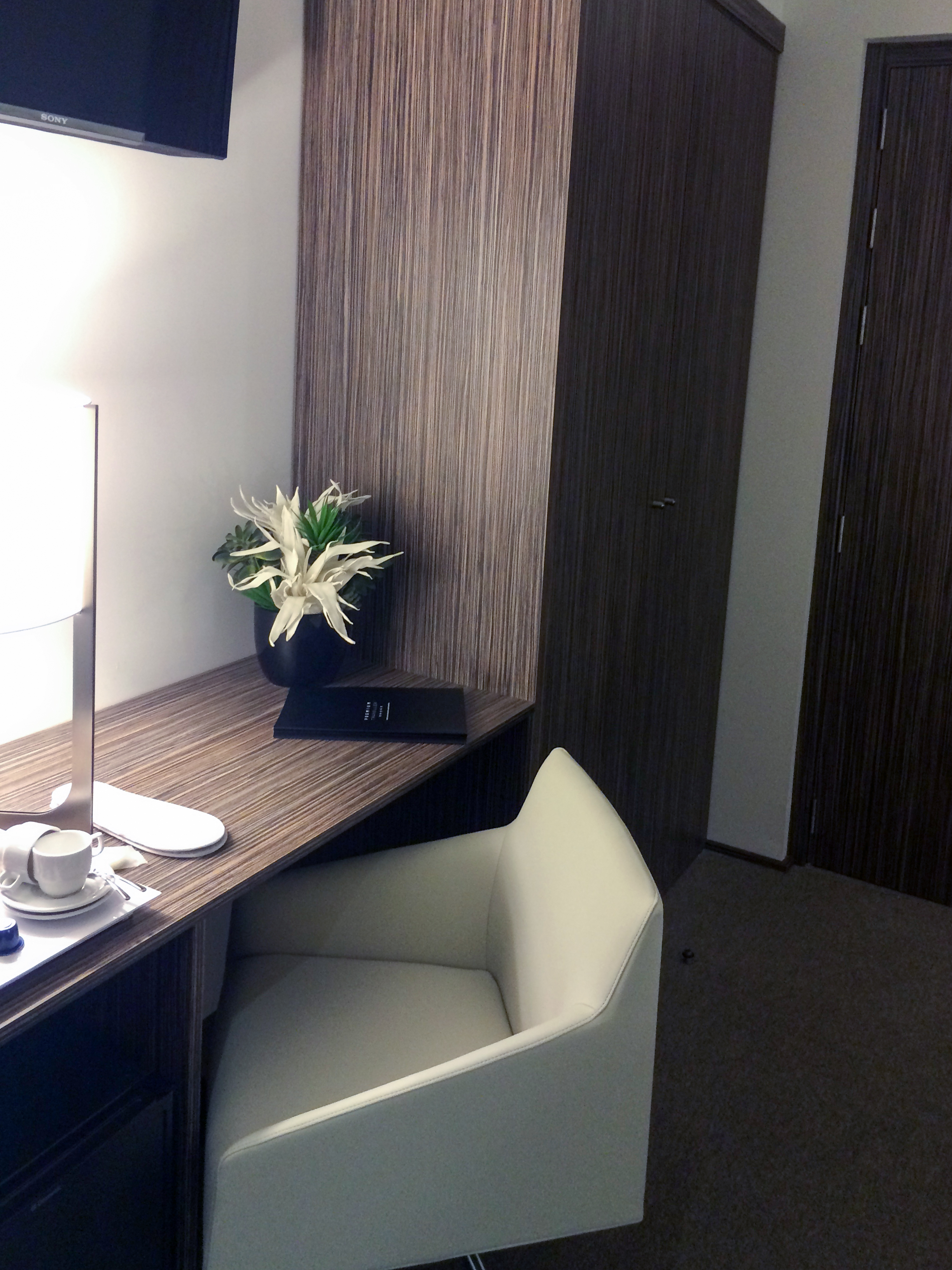 corner desk with modern upholstered chair